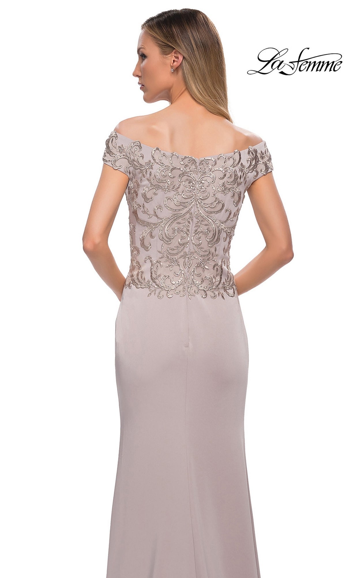 Woman in Long Formal Dress: La Femme 29331—taupe, off-the-shoulder, with fitted embroidered bodice, back view; “La Femme” logo top right.