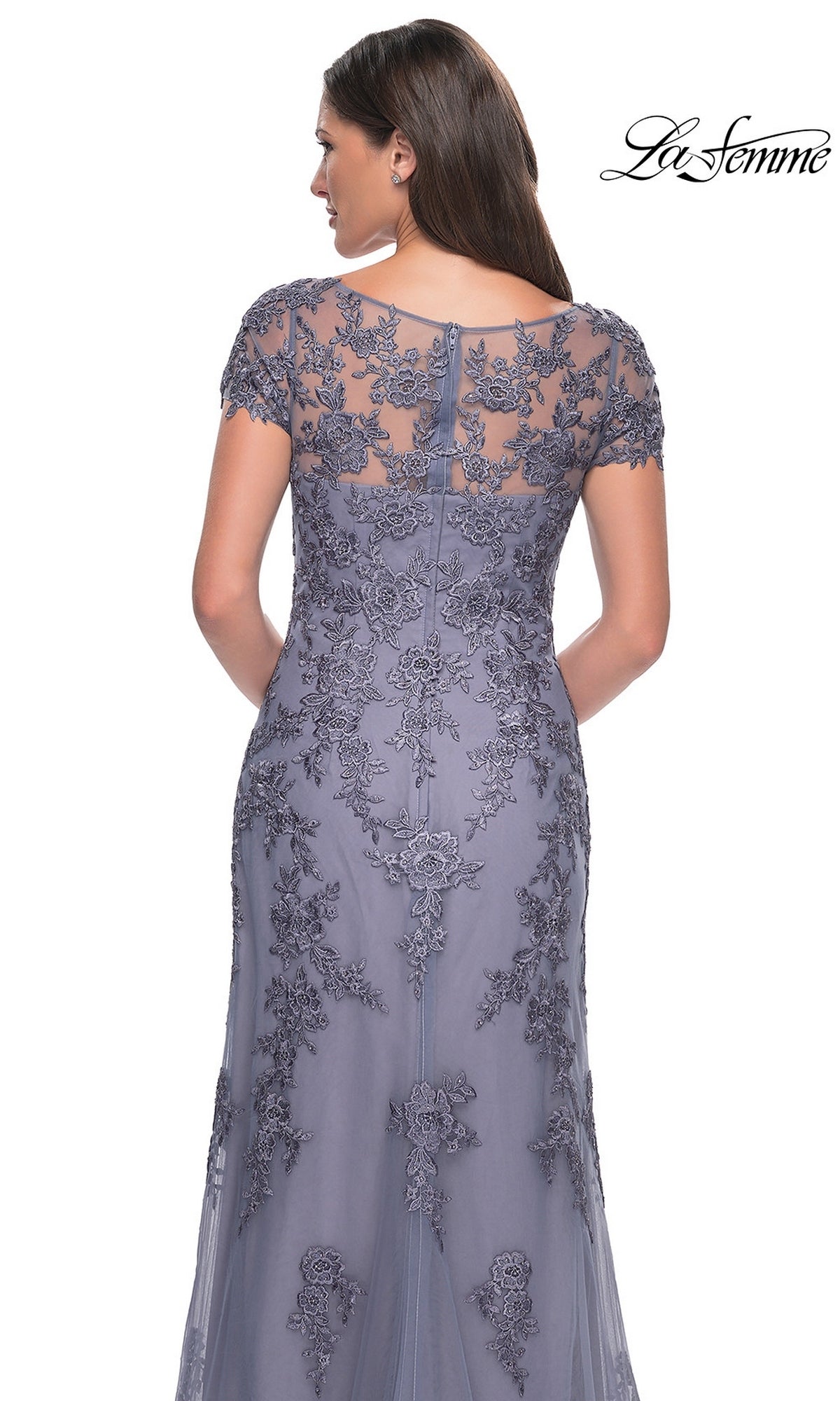 Back view of the Long Formal Dress: La Femme 29792, a floor-length grey lace gown with short cap sleeves and a sheer floral lace overlay.