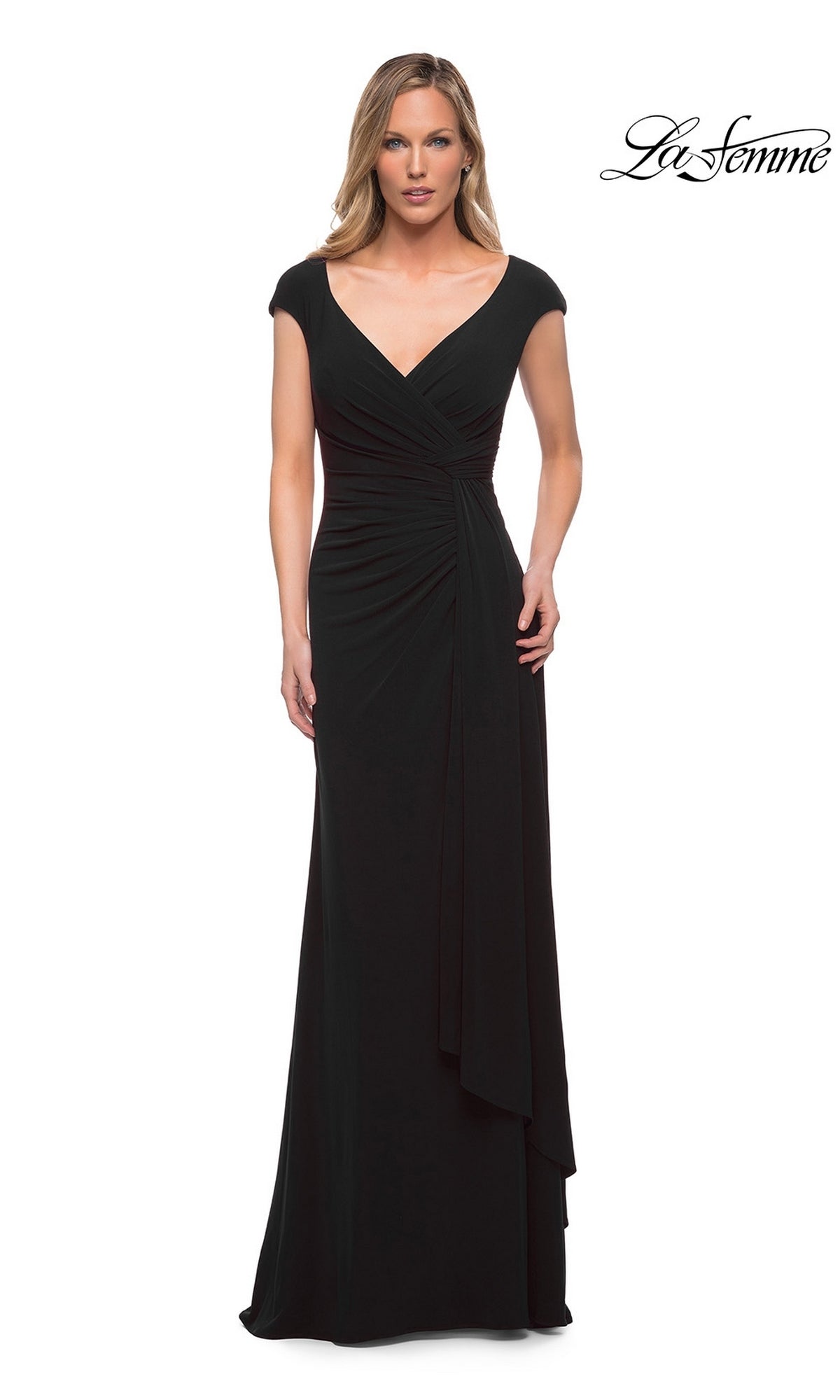 A woman wears a black La Femme 29814 long formal dress featuring cap sleeves, a V-neckline, and a gathered waist.