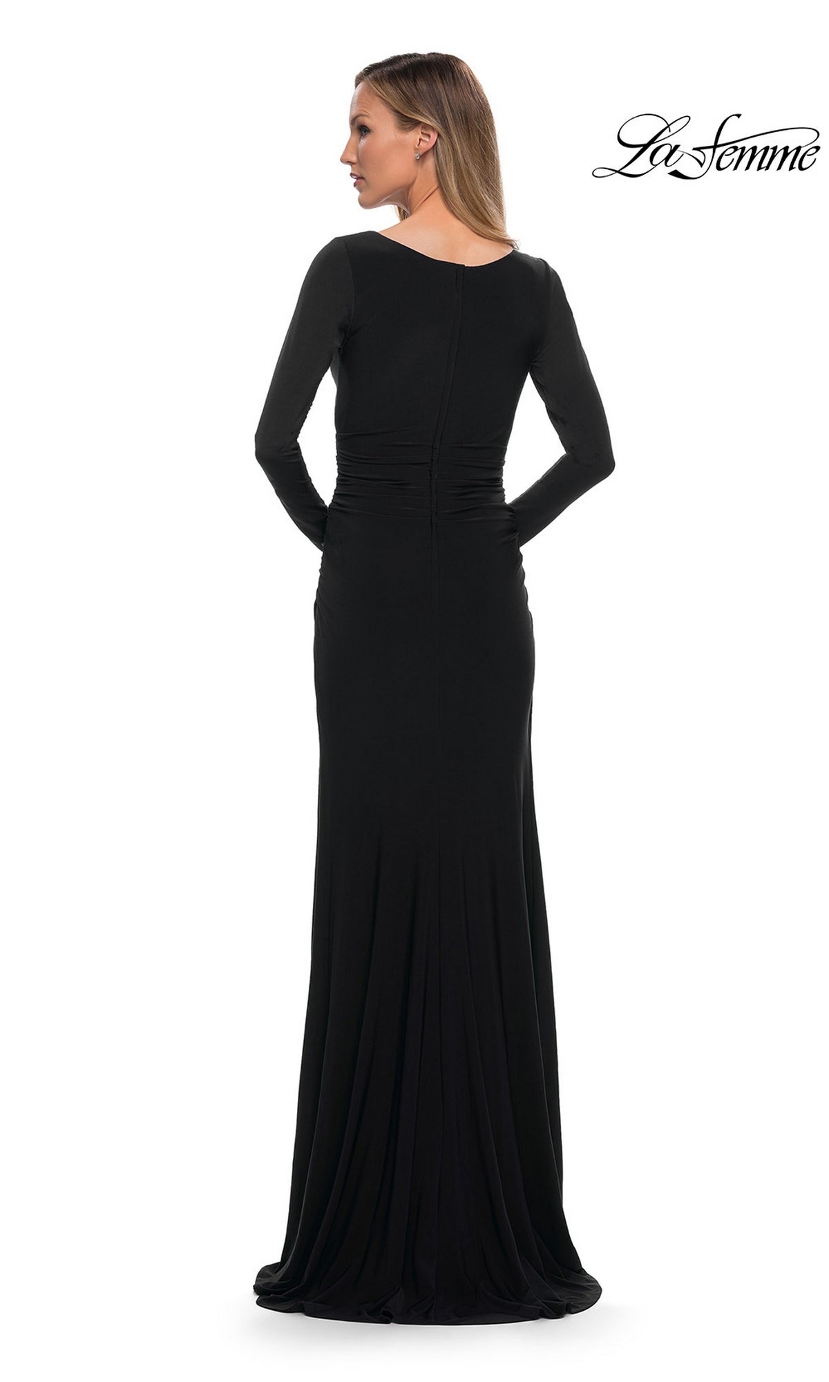 Back view of a woman wearing a La Femme 29924 long-sleeved black floor-length formal jersey dress with a ruched bodice.