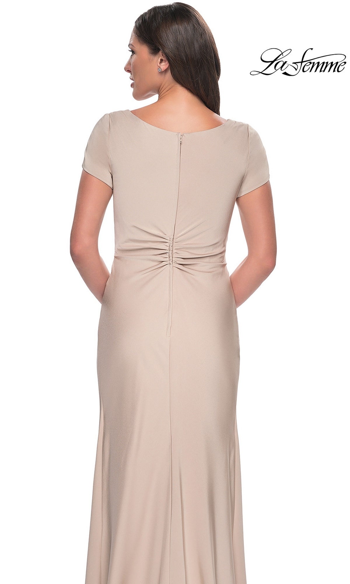 Back view of the floor-length beige Long Formal Dress: La Femme 29926, featuring cap sleeves and a ruched waist detail.