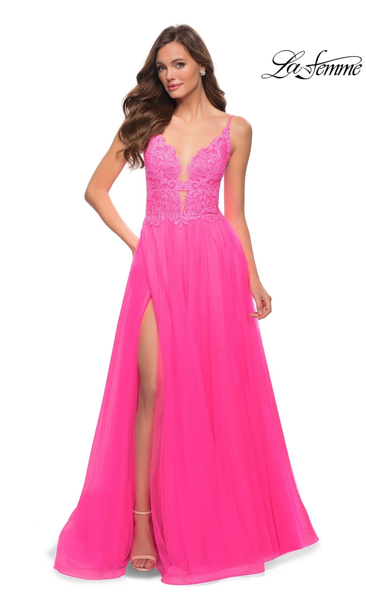 Long Prom Dress: La Femme 29964 in neon pink featuring a lace bodice, spaghetti straps, and a floor-length A-line skirt with a high side slit.