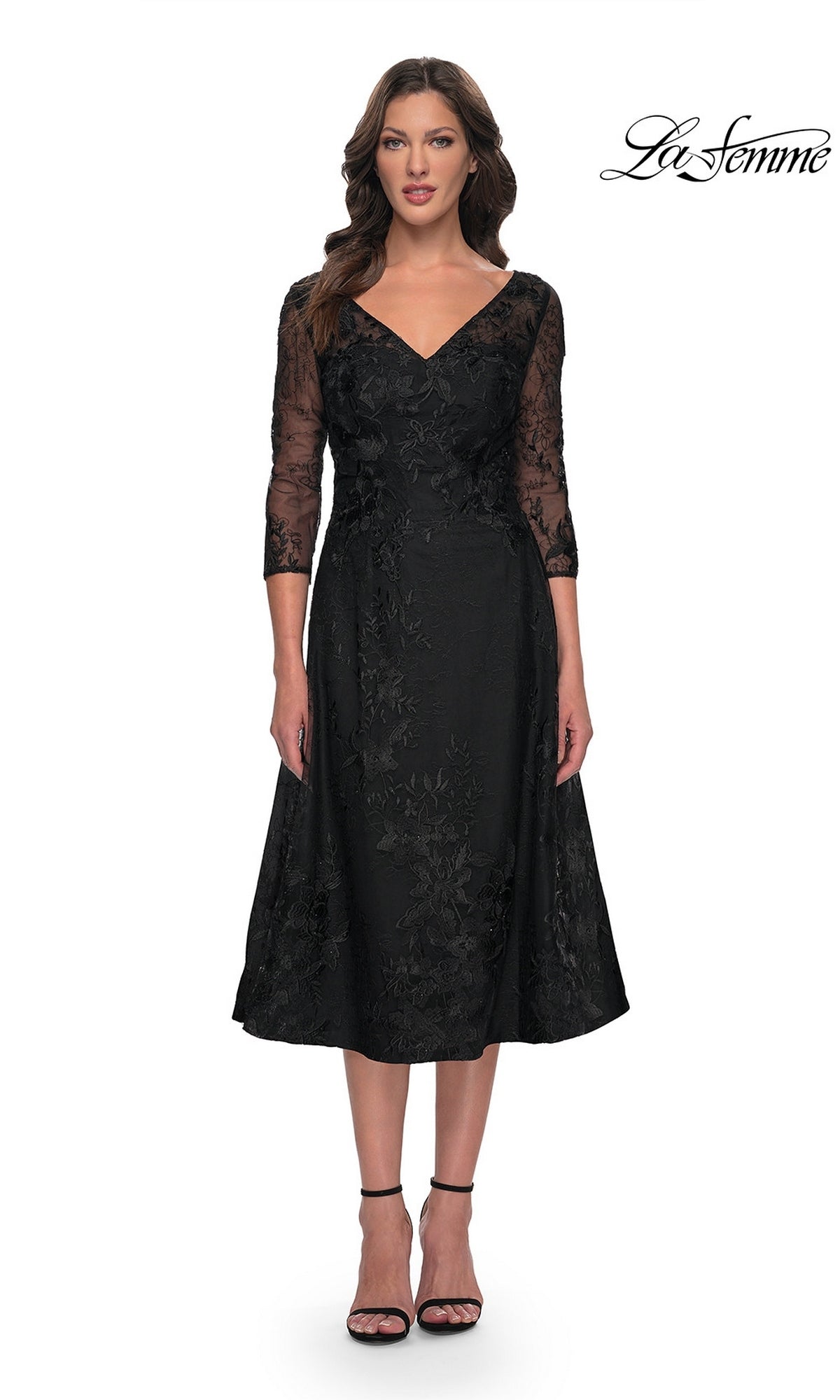 Black La Femme 30016 midi wedding guest dress featuring a V-neck, three-quarter length sleeves, and floral embroidery.