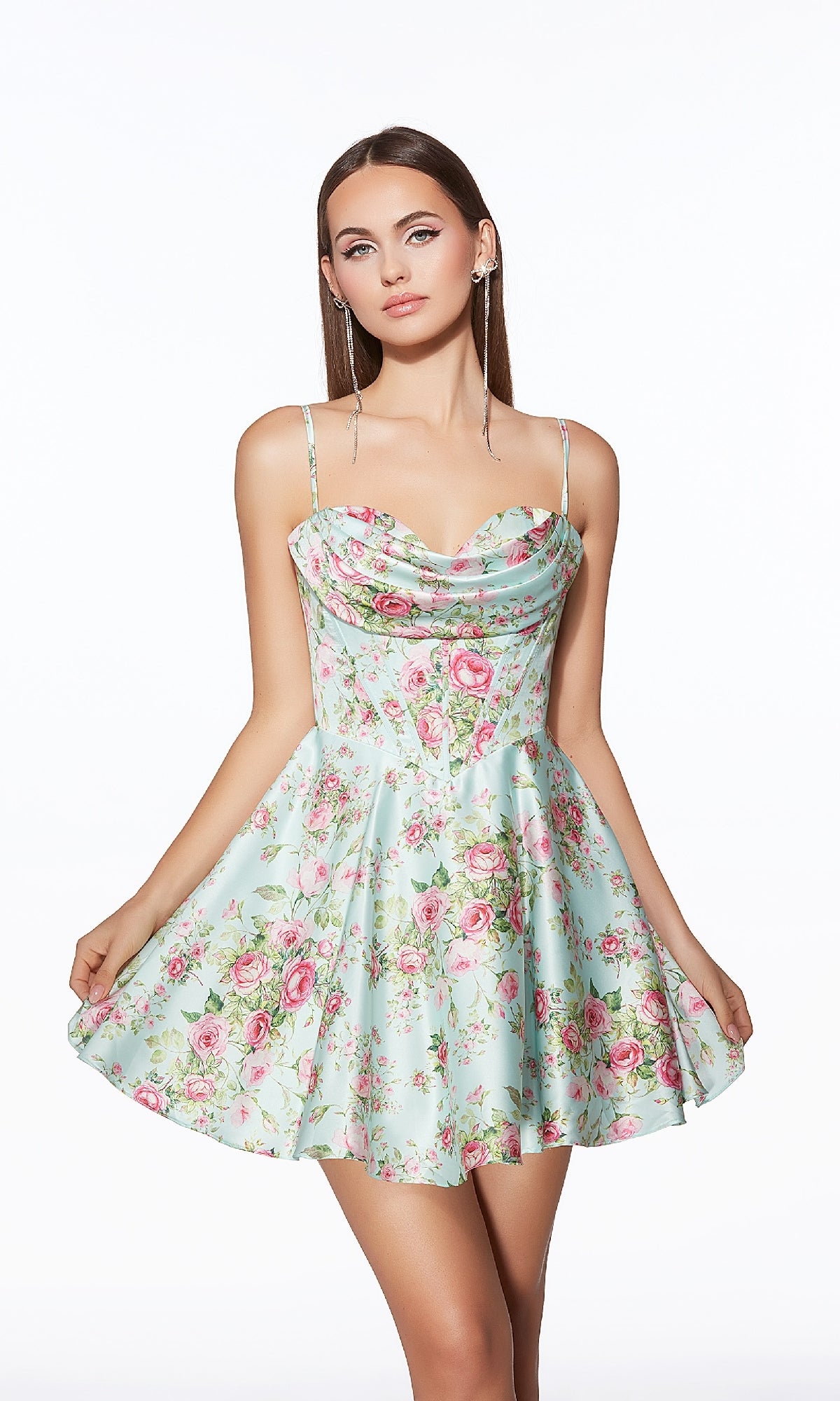 A woman models the Alyce 30043 Short Homecoming Dress—a sleeveless, tiffany blue fit-and-flare style with a pink floral pattern—standing against a plain white background.