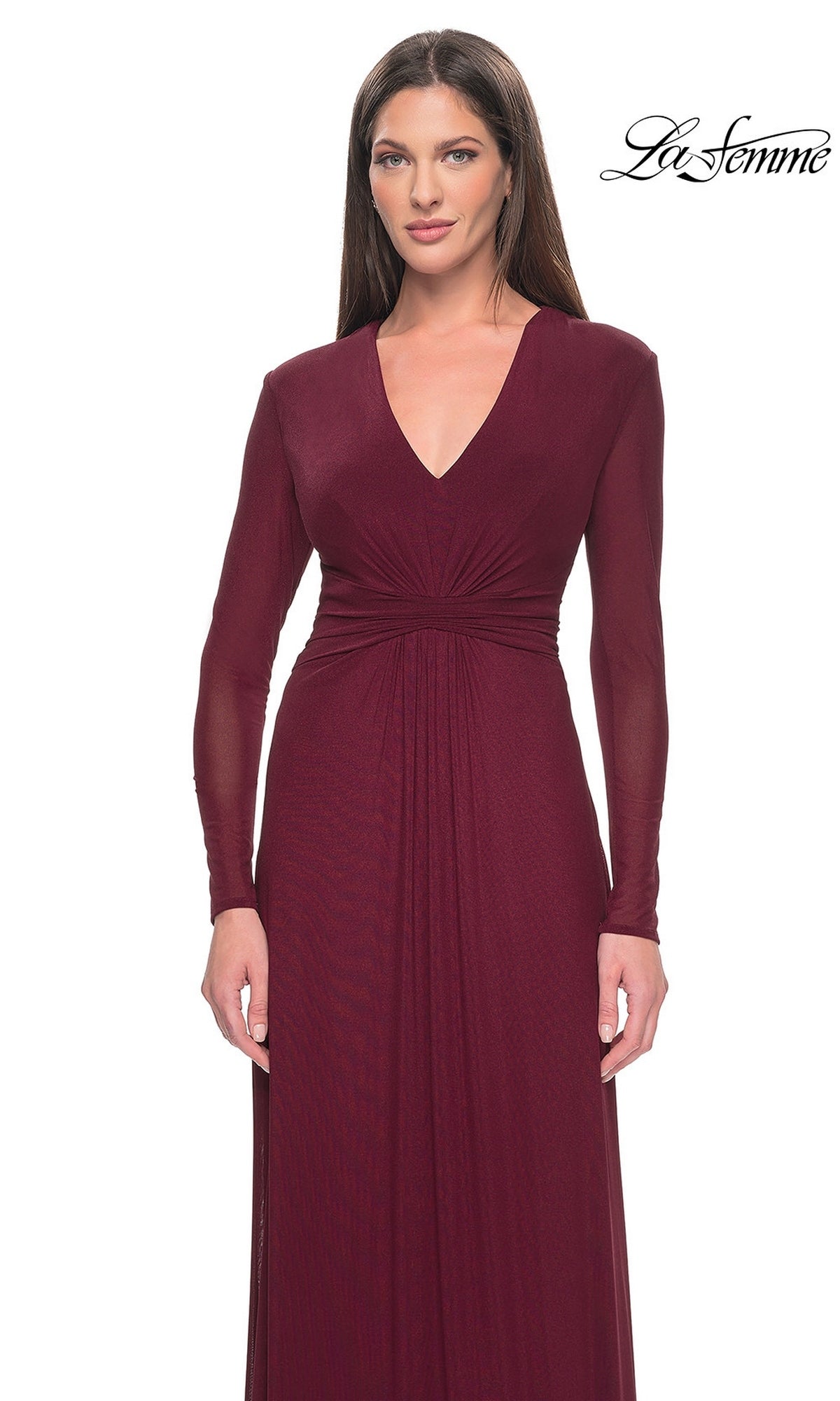 A woman wearing the Long Formal Dress: La Femme 30048, a long-sleeved, burgundy V-neck modest formal dress with a gathered waist.