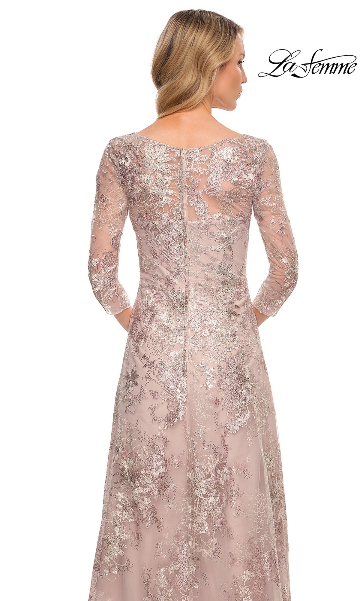 Back view of a mauve metallic lace La Femme 30054 mother of the bride dress, featuring a long, three-quarter sleeve silhouette with a floral overlay and a scoop neckline.