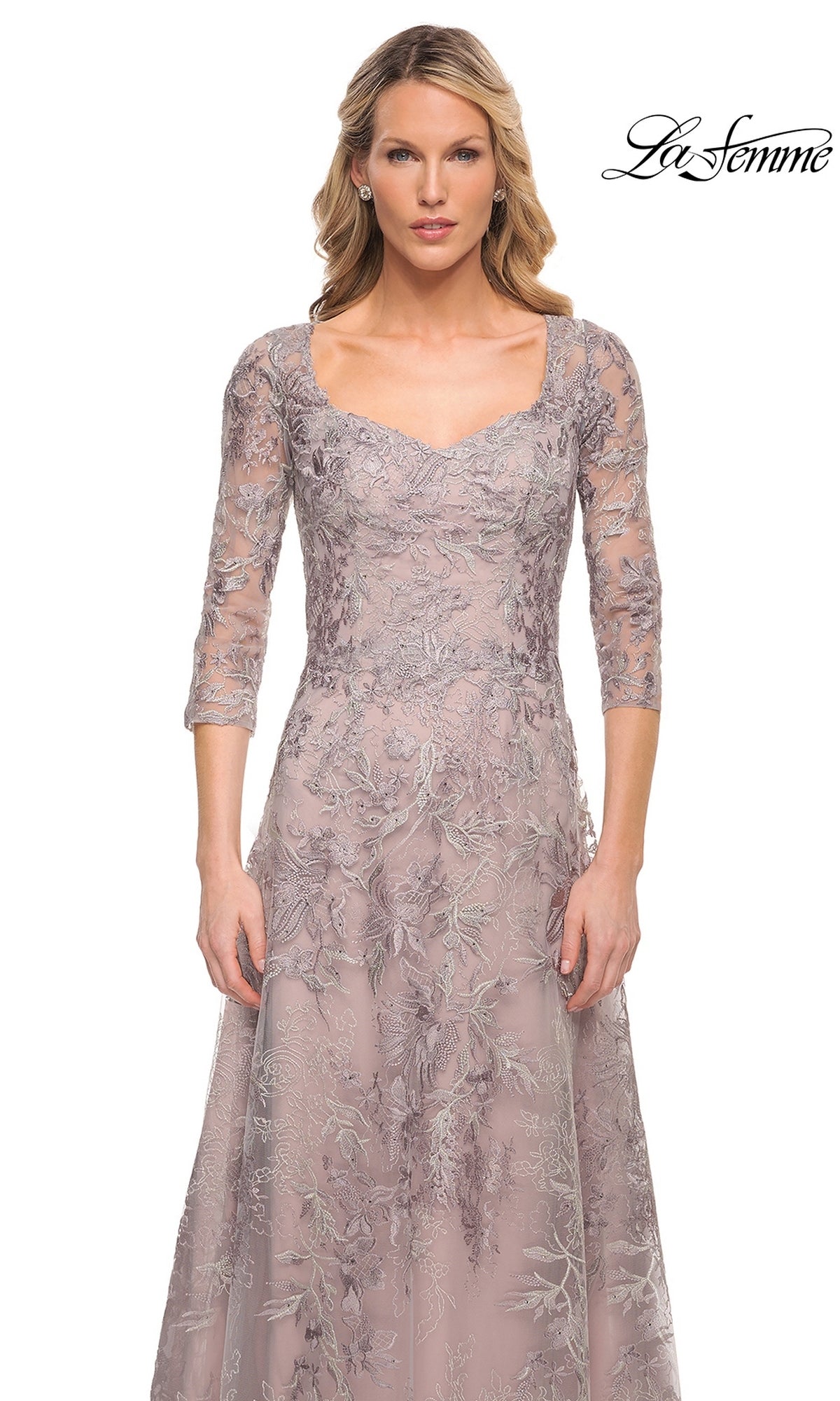 La Femme 30078 is a dusty rose-colored floor-length lace embroidered formal dress with three-quarter sleeves and floral details.