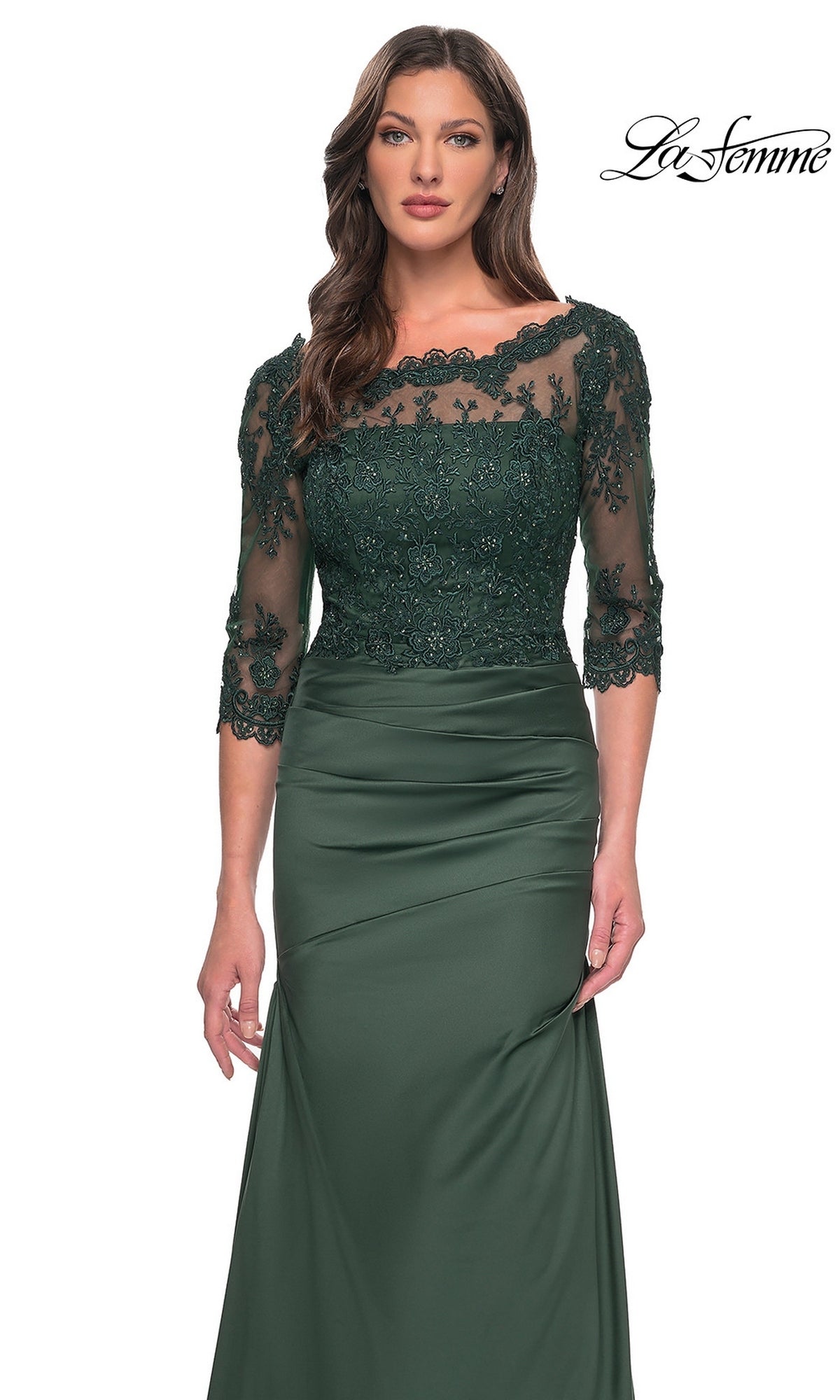 Woman wearing a dark green Long Formal Dress: La Femme 30162 with lace and bead bodice, three-quarter sleeves; “La Femme” logo in the top right corner.