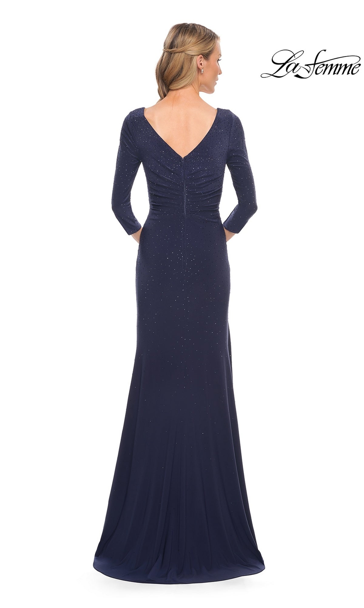 Back view of a floor-length navy La Femme 30177 formal dress featuring three-quarter sleeves, a V-neckline, and scattered rhinestones.