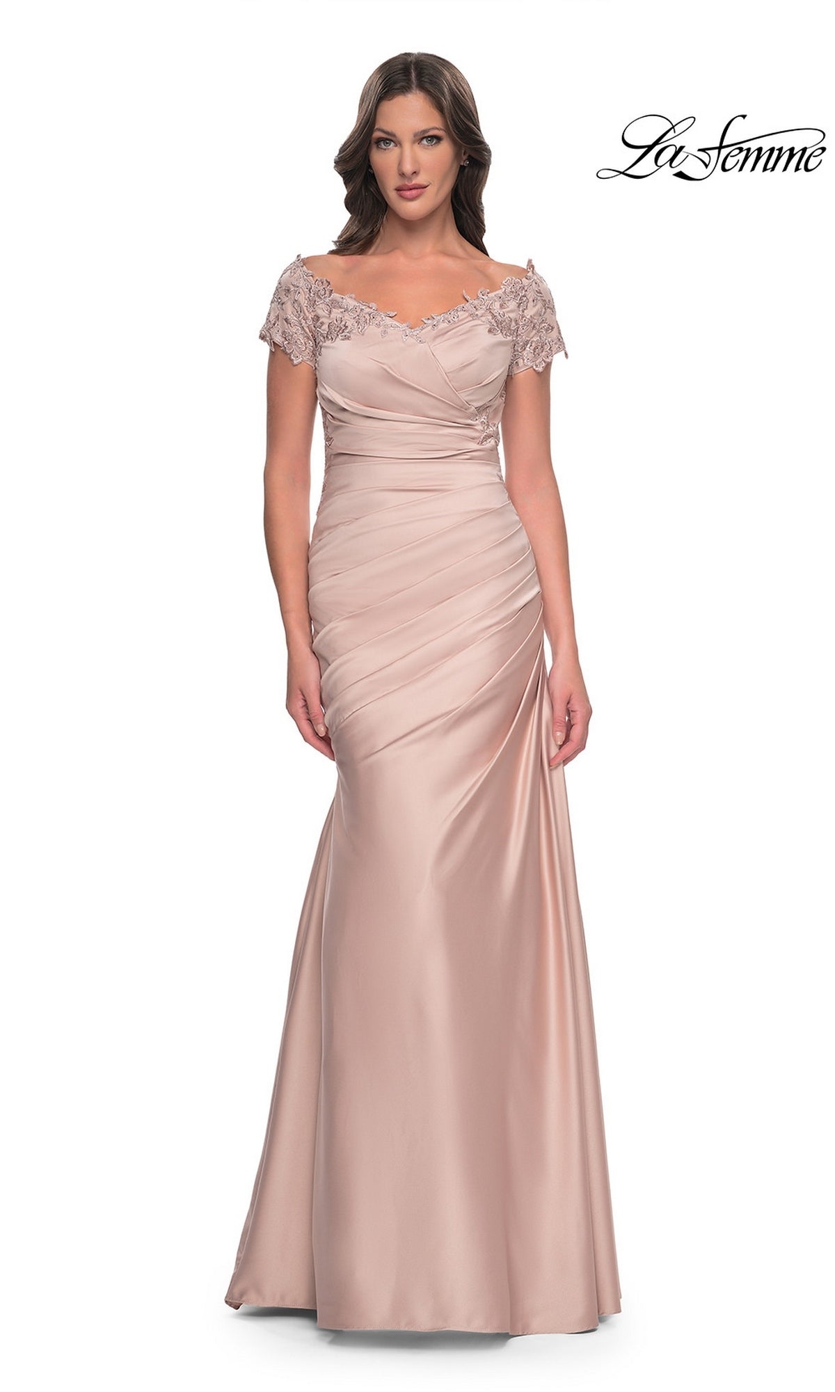 La Femme 30199 long formal dress in pale pink, featuring an off-the-shoulder mermaid silhouette, short lace sleeves, and a ruched bodice.
