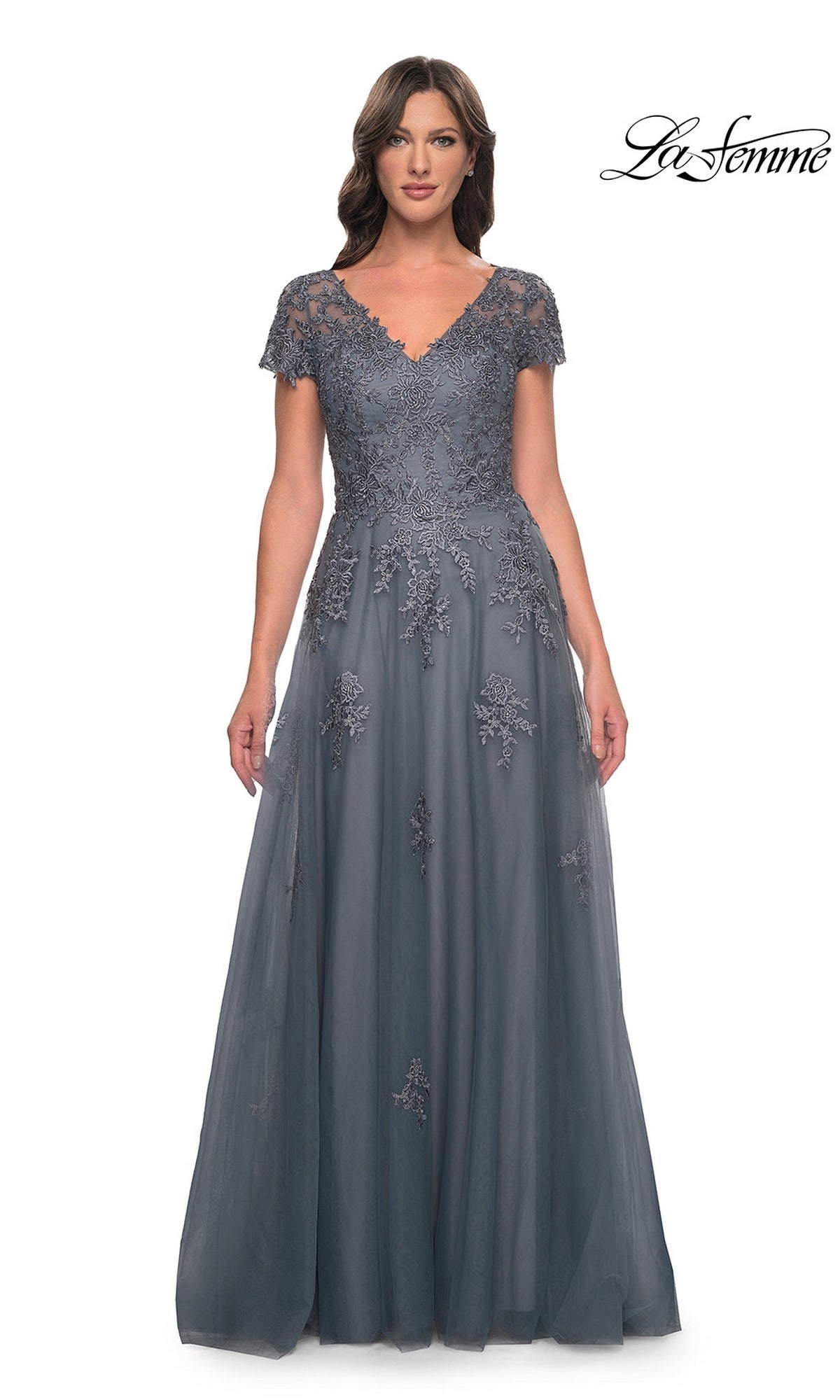 La Femme 30228 slate blue A-line tulle evening gown with a V-neckline, short lace sleeves, and floral embroidery on the bodice and skirt.
