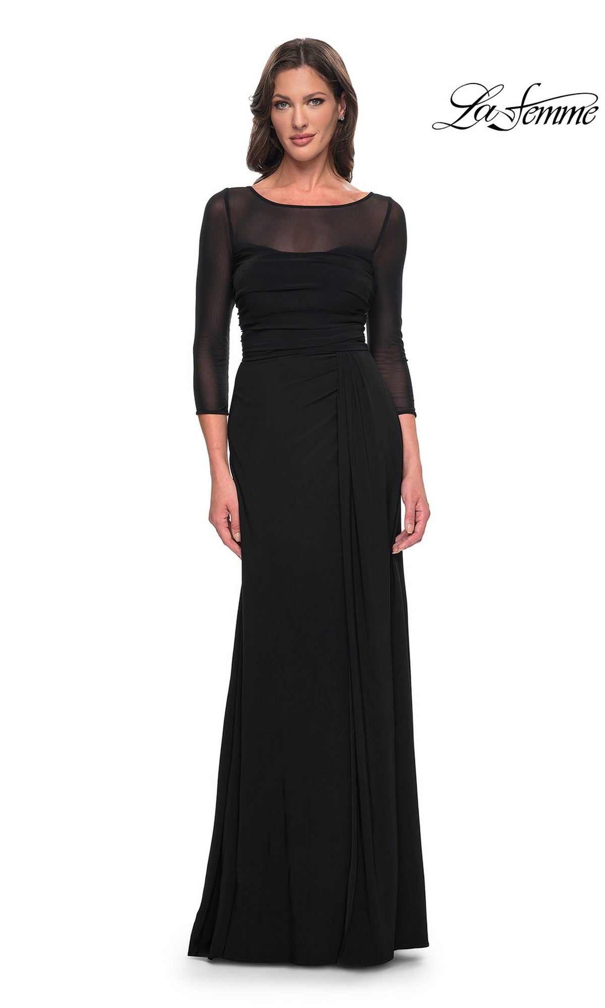 A woman wearing a La Femme 30230 long formal dress in black, featuring a floor-length hem, a modest illusion neckline, and sheer three-quarter sleeves.