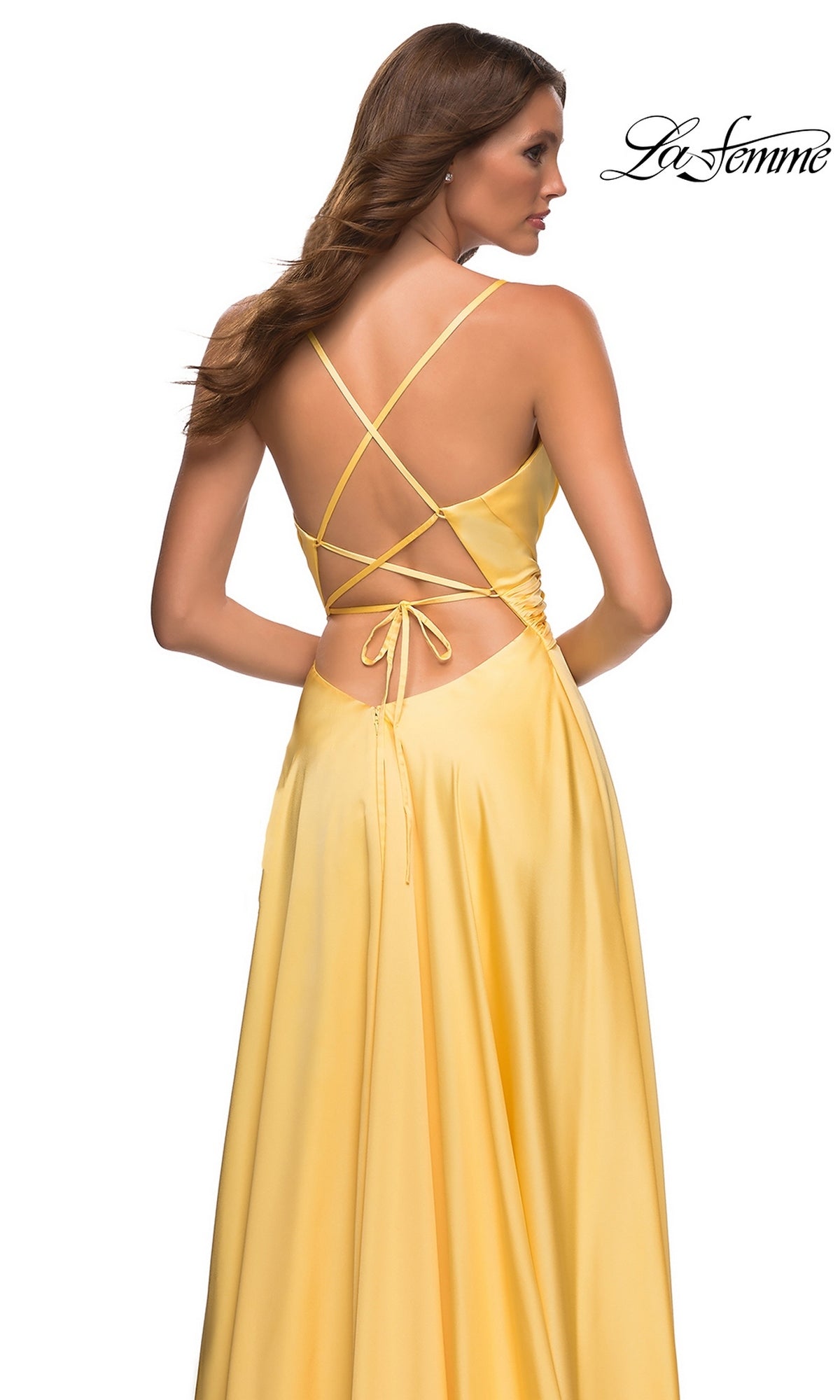 Back view of a yellow satin Long Prom Dress: La Femme 30662, featuring a floor-length A-line skirt and a lace-up open back with spaghetti straps.