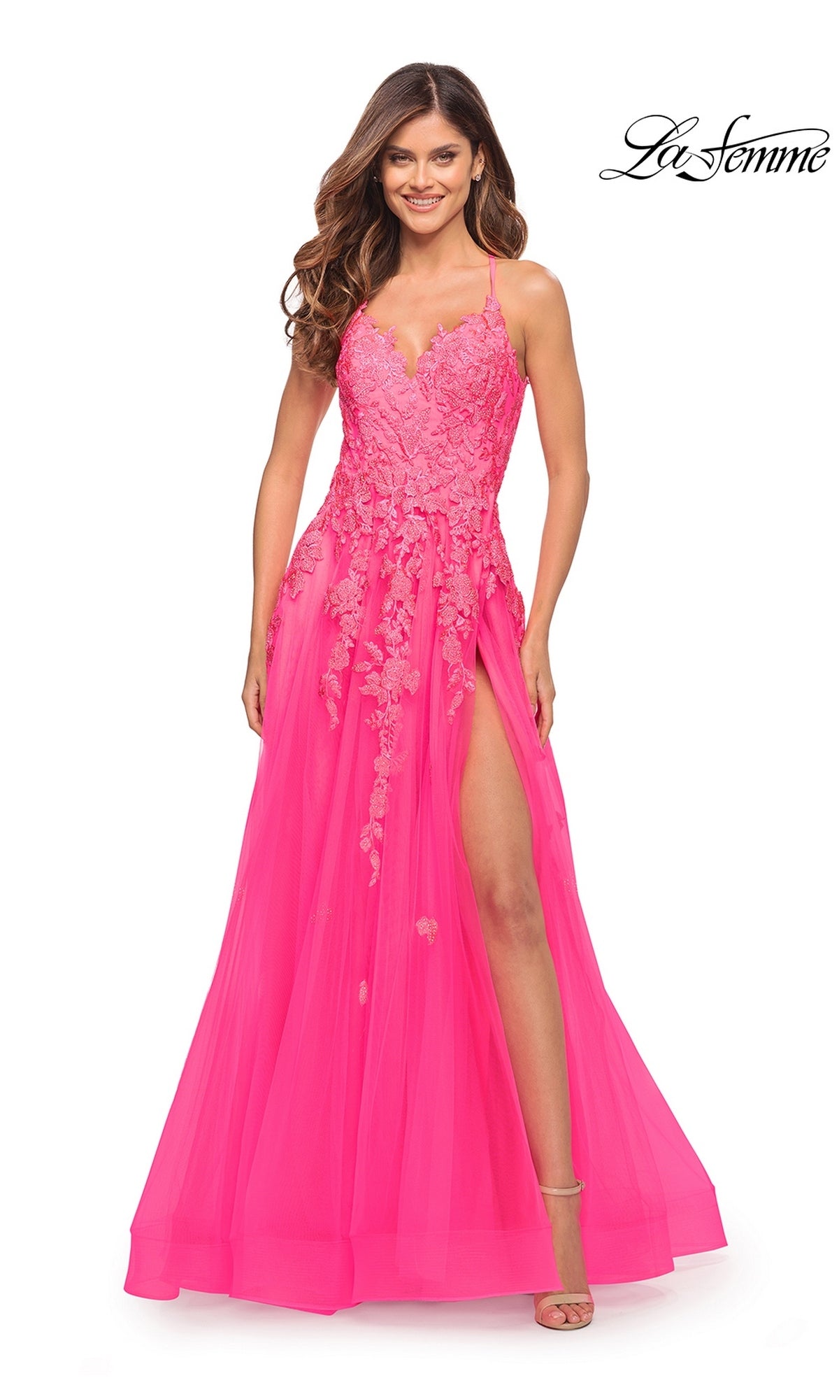 La Femme 30693 neon pink lace bodice ball gown featuring a sleeveless floor-length silhouette and a high leg slit.