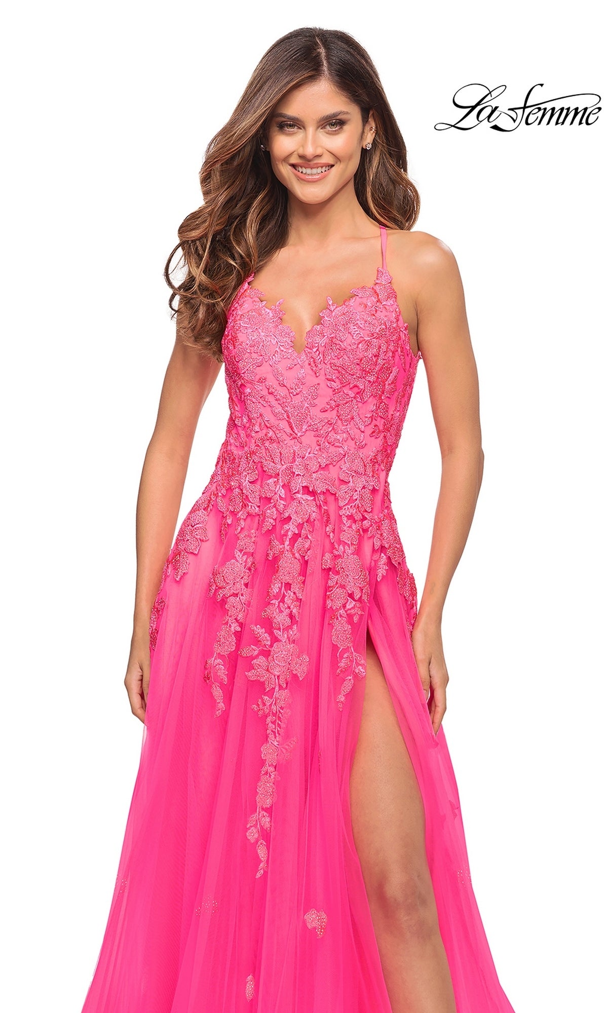 La Femme 30693 long prom dress in neon pink, featuring a floor-length silhouette, plunging neckline, floral lace bodice, and a high leg slit.