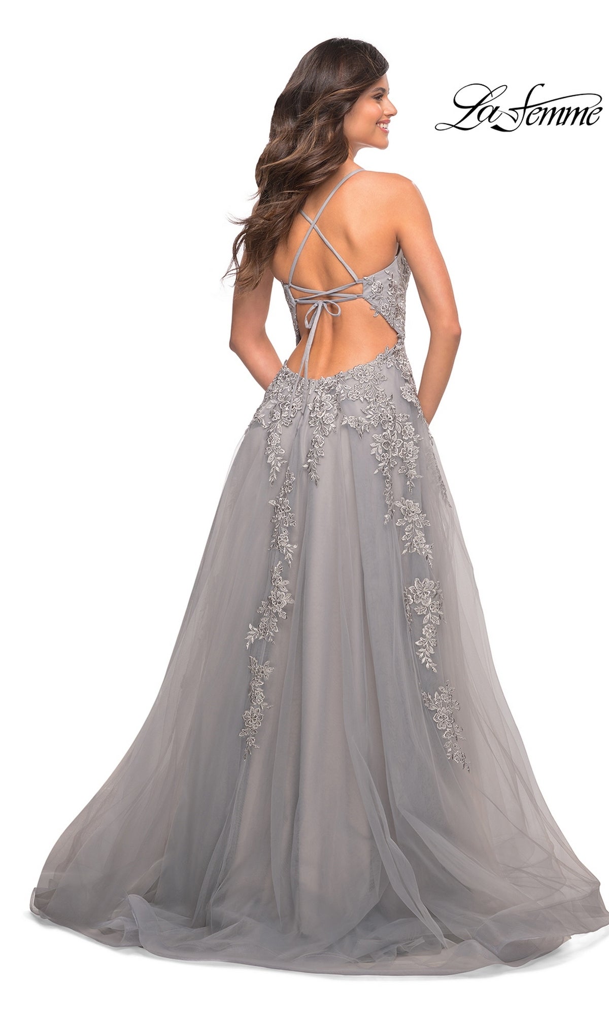 La Femme 30810 long prom dress in grey, featuring a floor-length silhouette, a lace-up open back, and floral applique accents on the bodice and skirt.