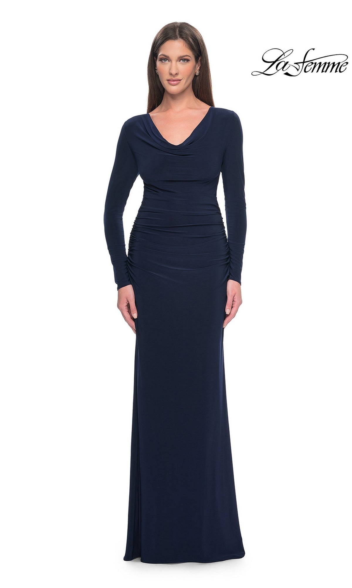 A woman wears the navy Long Formal Dress: La Femme 30813, a long-sleeve gown featuring a cowl neckline and a ruched waist.