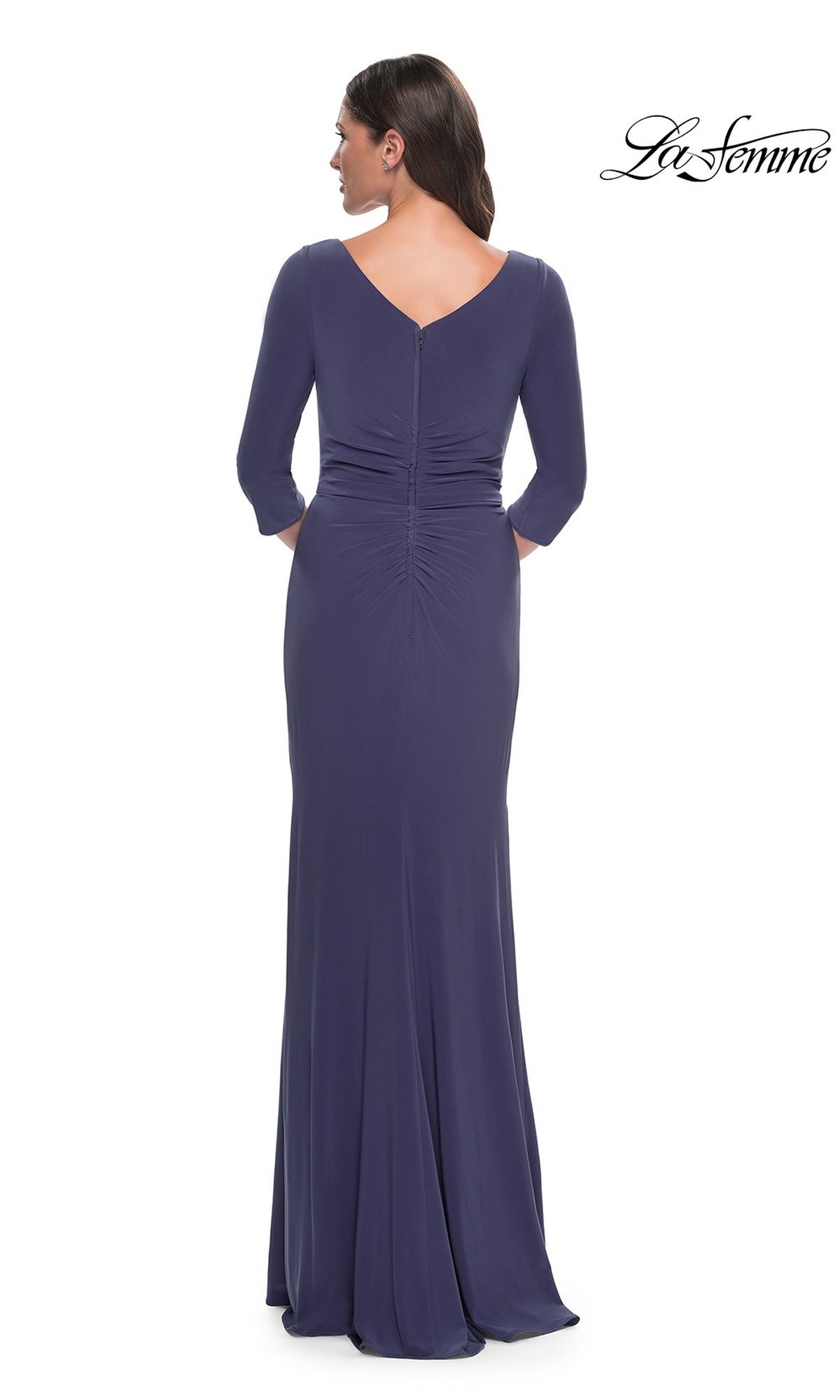 Back view of a floor-length, smoky blue Long Formal Dress: La Femme 30814 with three-quarter sleeves and a ruched waist.