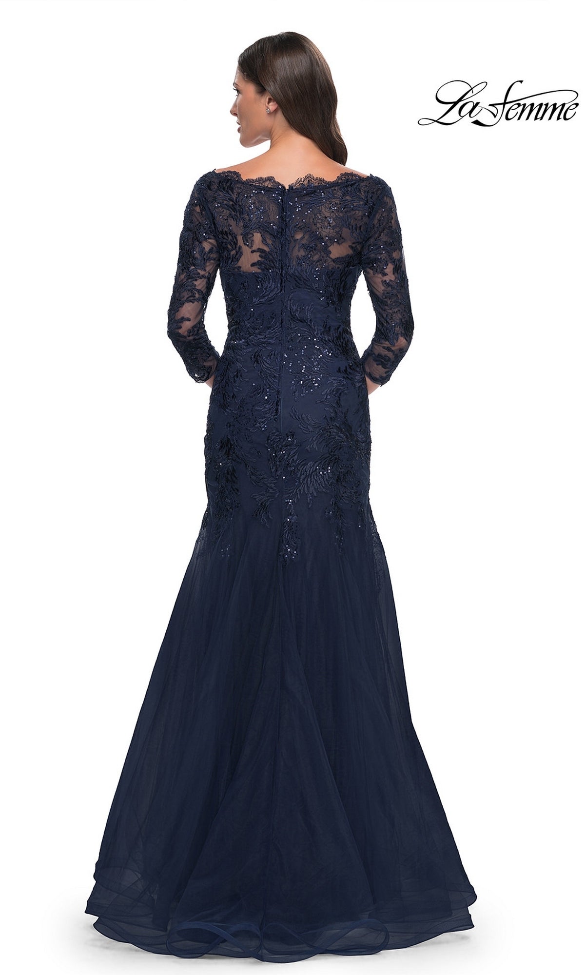 Back view of the Long Formal Dress: La Femme 30823, a floor-length navy blue modest lace mermaid dress with an off-the-shoulder neckline, three-quarter sleeves, and intricate sequin detailing on the bodice.