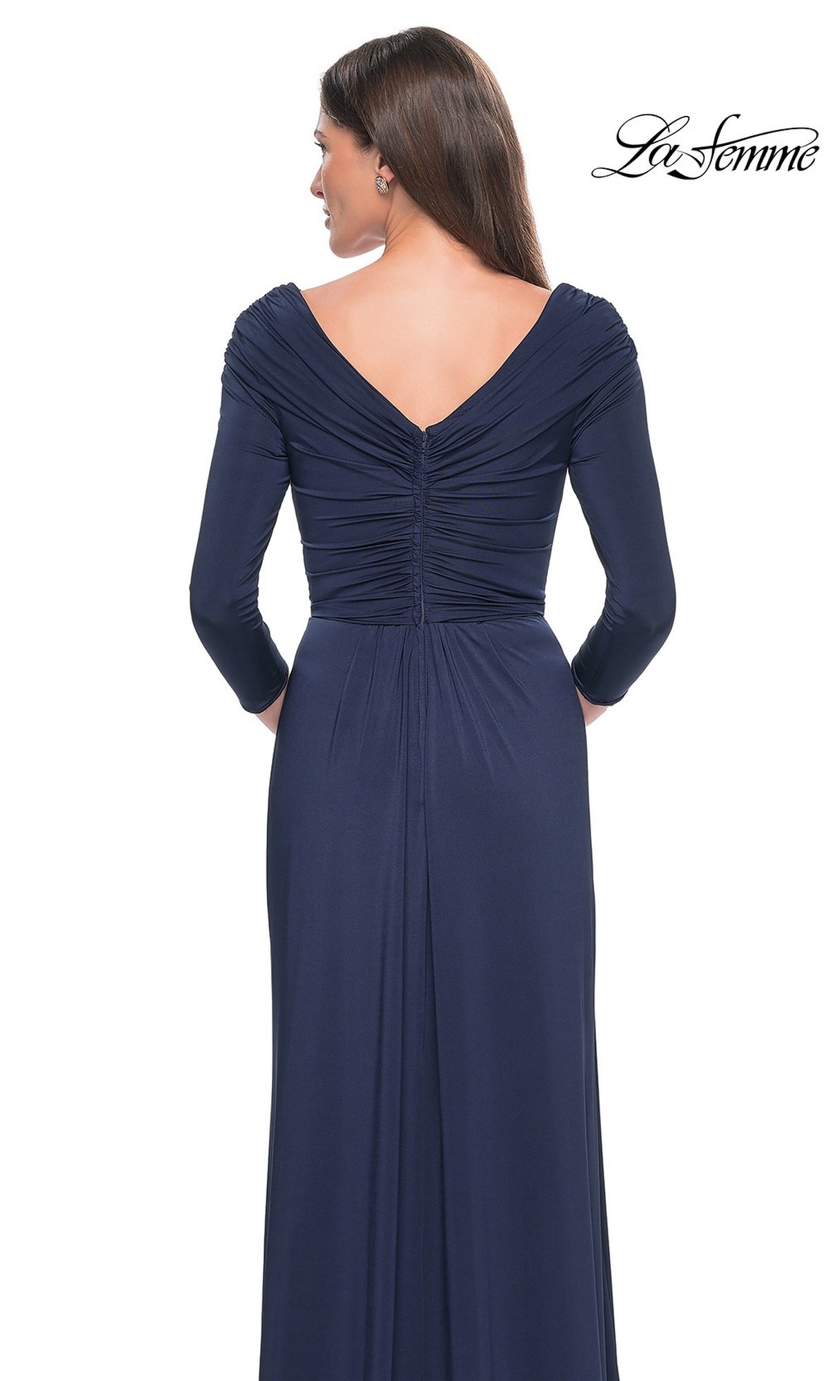 Back view of the floor-length navy blue La Femme 30845 jersey formal dress, featuring a V-neck, ruched bodice, and three-quarter length sleeves.