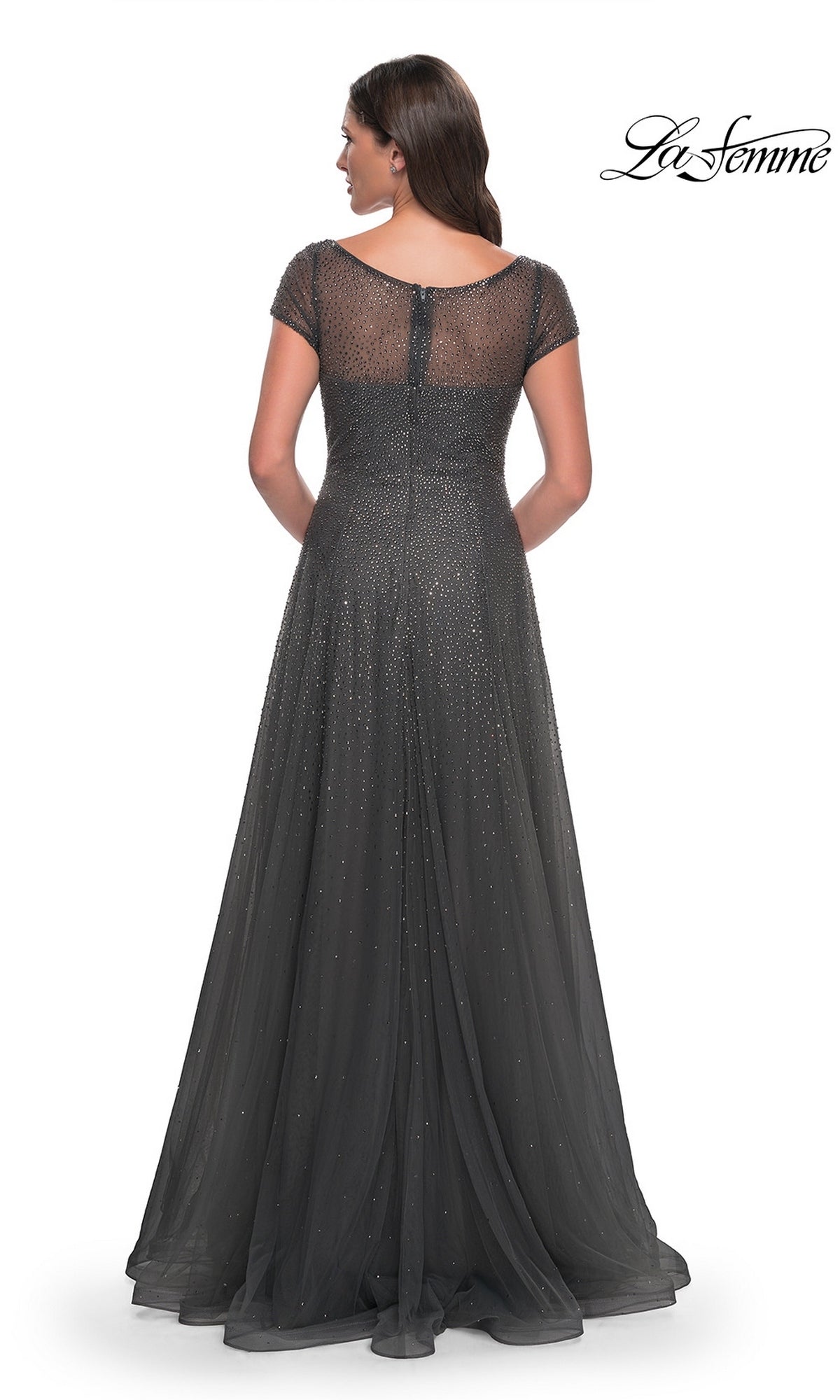 Back view of the Long Formal Dress: La Femme 30852 in charcoal gray, featuring cap sleeves and a sheer, rhinestone-beaded bodice and skirt.