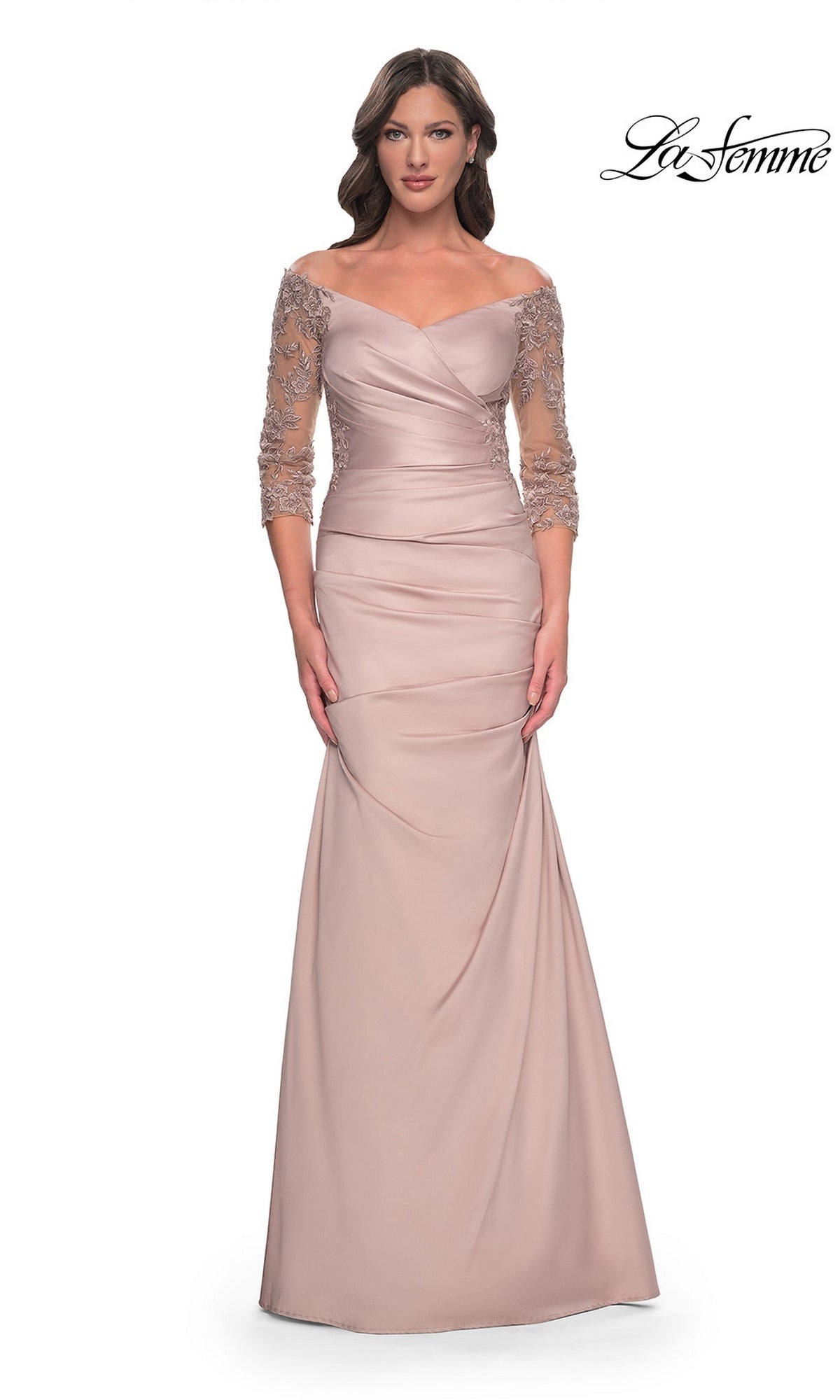 Champagne-colored La Femme 30853 long formal dress with an off-the-shoulder neckline, sheer lace-trimmed three-quarter length sleeves, and a trumpet skirt.
