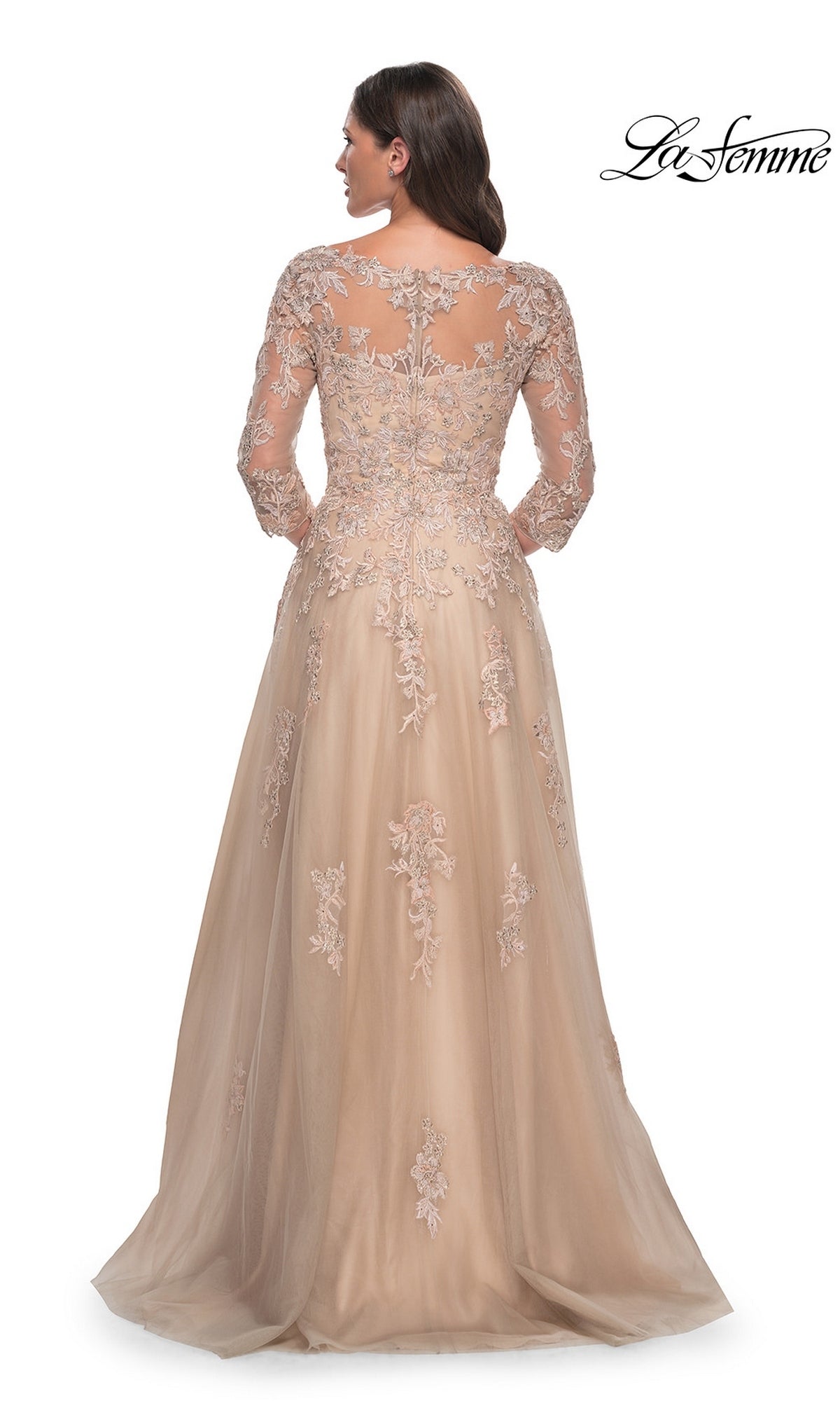 Back view of the Long Formal Dress: La Femme 30859, a nude-champagne gown featuring long lace sleeves and an illusion neckline with floral appliqué detailing.