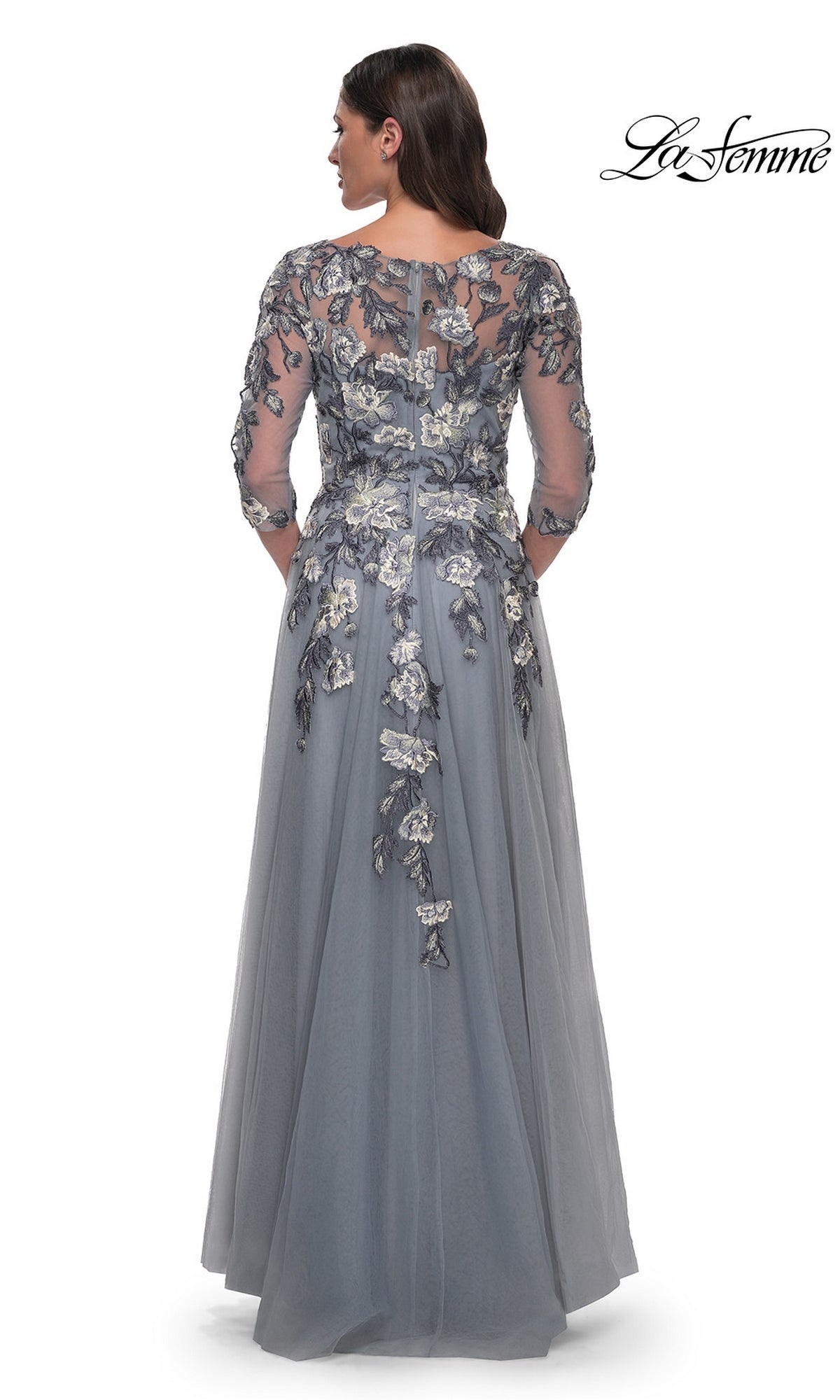 Back view of the Long Formal Dress: La Femme 30968, a floor-length slate blue gown with three-quarter sleeves and delicate floral embroidery.