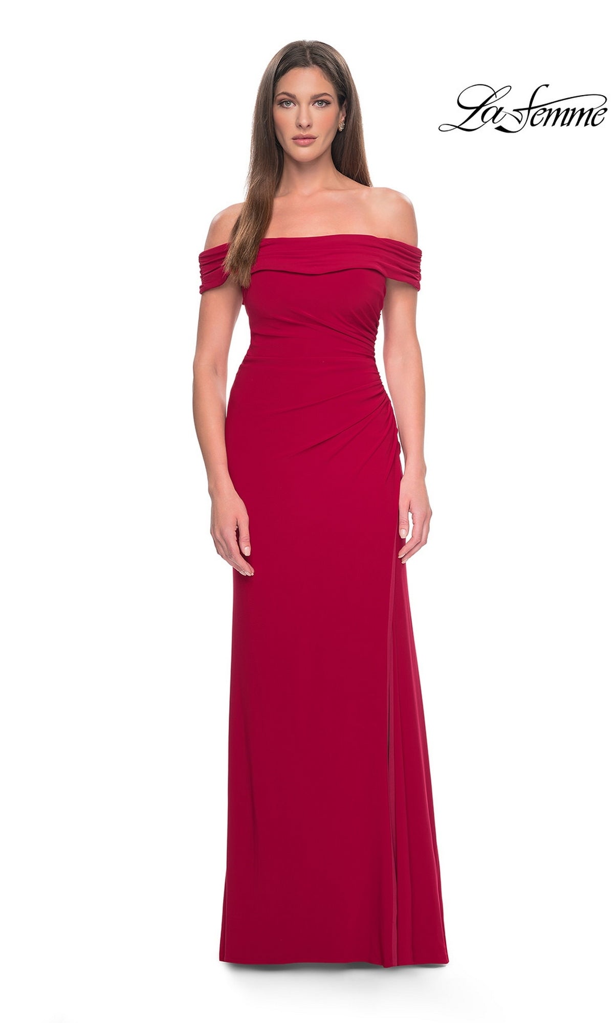Red La Femme 31086 off-the-shoulder jersey formal dress with a draped neckline, side ruching, and a floor-length silhouette featuring a high-leg slit.