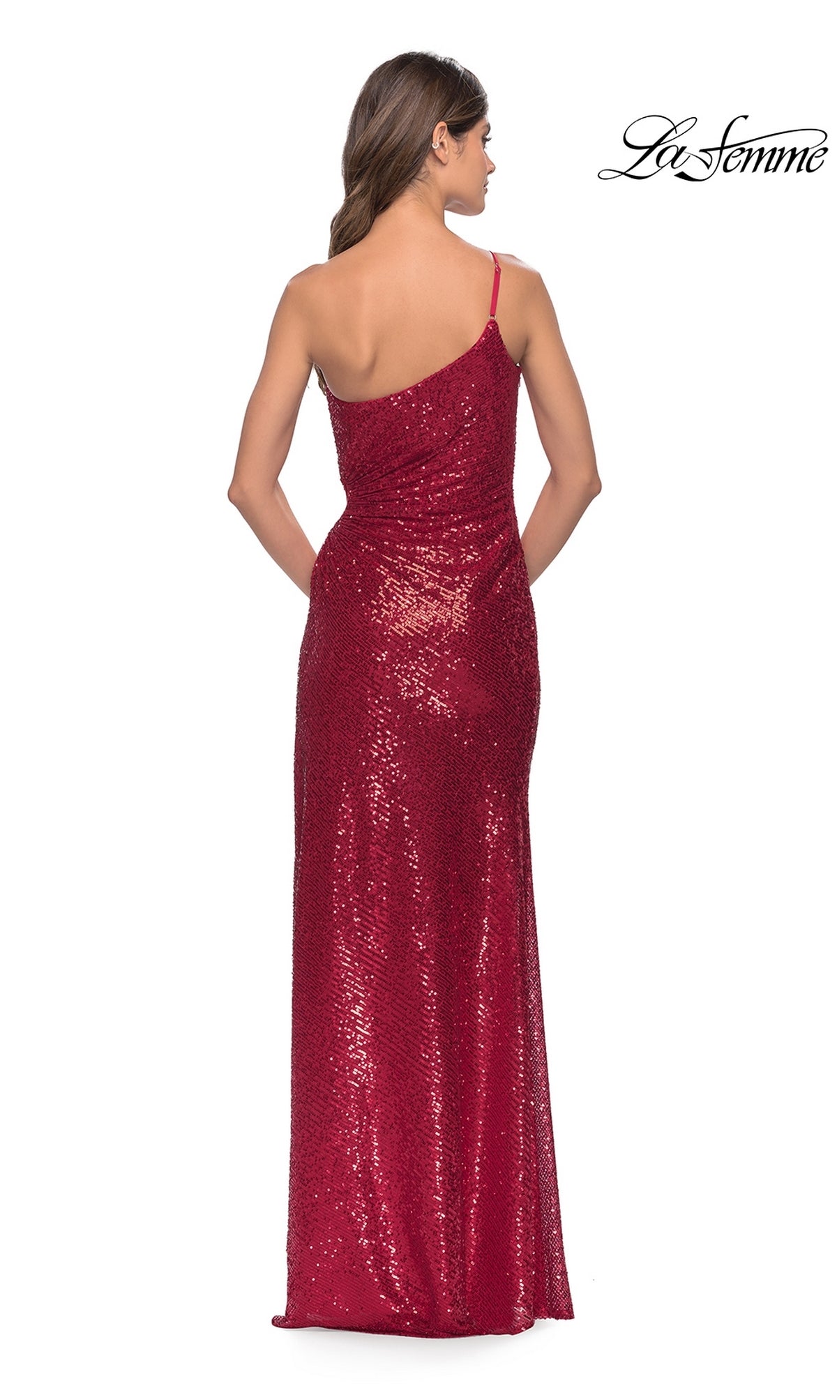 A woman is seen from the back in the La Femme One-Shoulder Long Sequin Prom Dress 31089, a red, fitted floor-length gown. The La Femme logo is displayed in the top right corner.