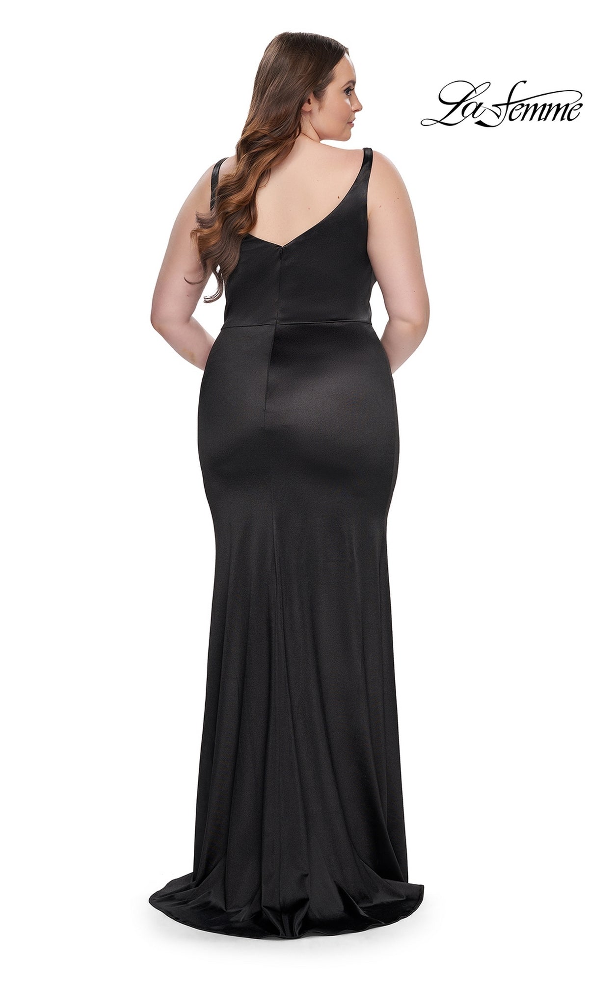 A woman stands with her back to the camera, wearing the La Femme Long Prom Dress 31266—a black, sleeveless formal gown with a V-shaped back. The La Femme logo is visible in the top right corner.