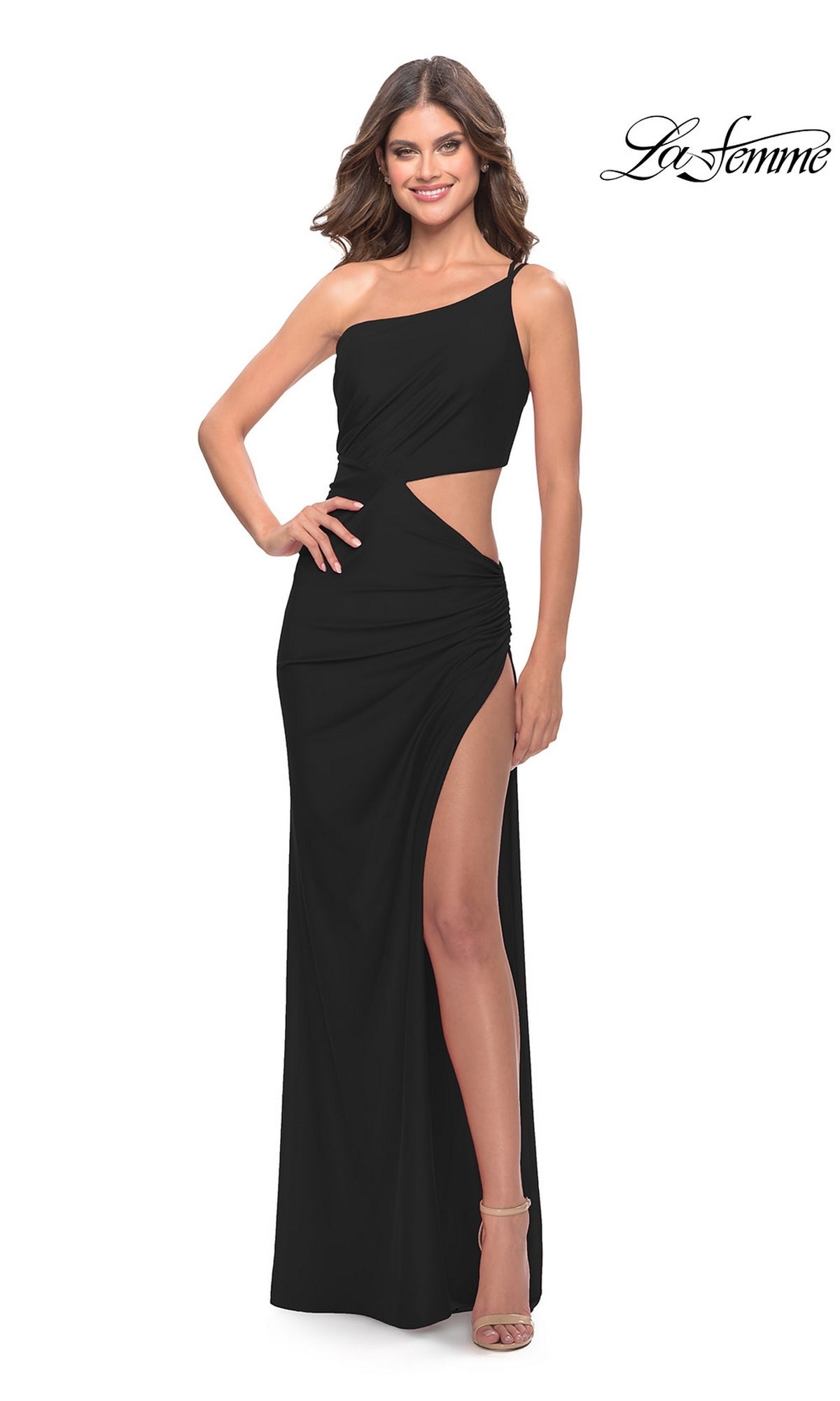 A woman wears the black La Femme 31386 long prom dress, featuring a floor-length one-shoulder design with a cutout and a side slit.