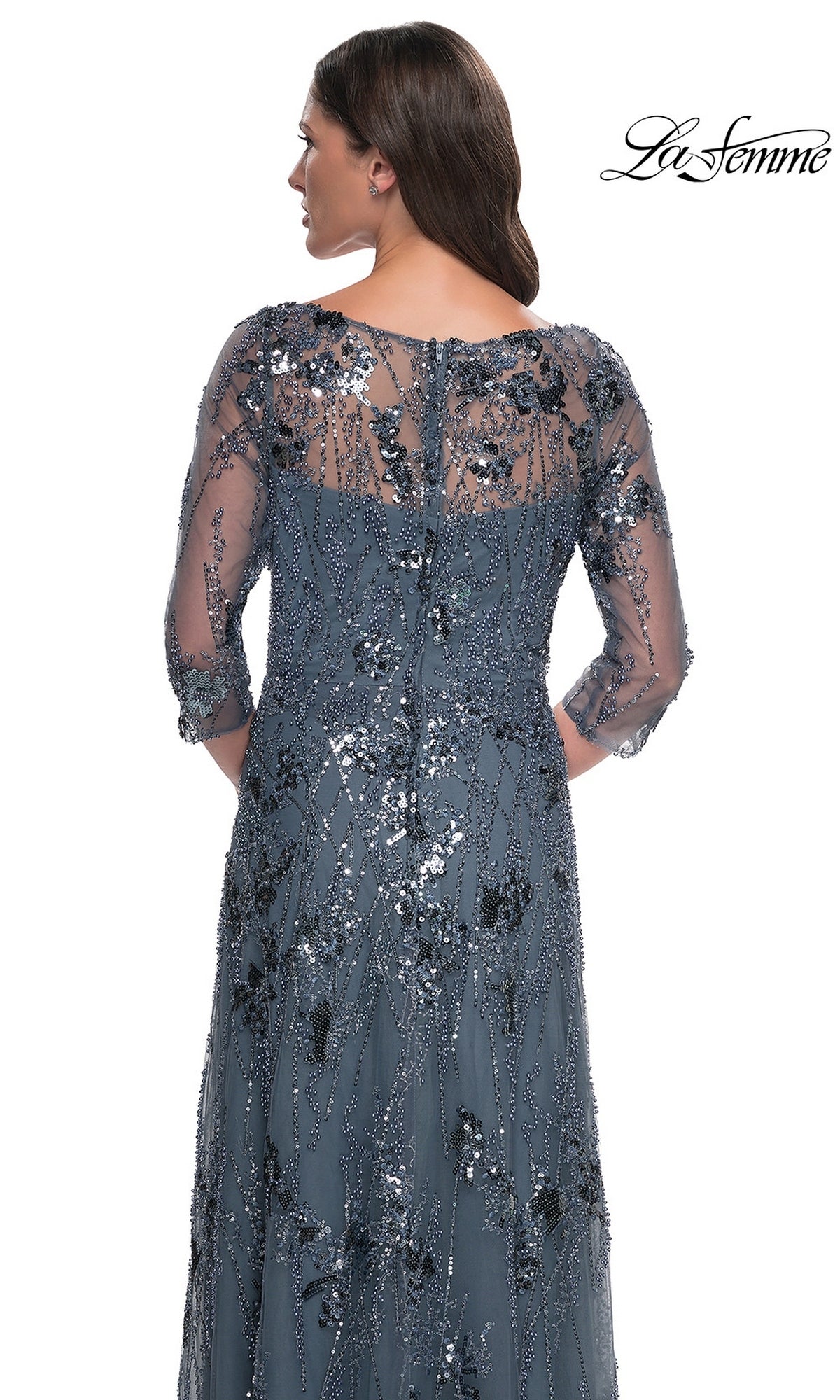 Back view of the Long Formal Dress: La Femme 31458, a slate gray beaded gown featuring three-quarter sleeves and delicate floral sequin embellishments.