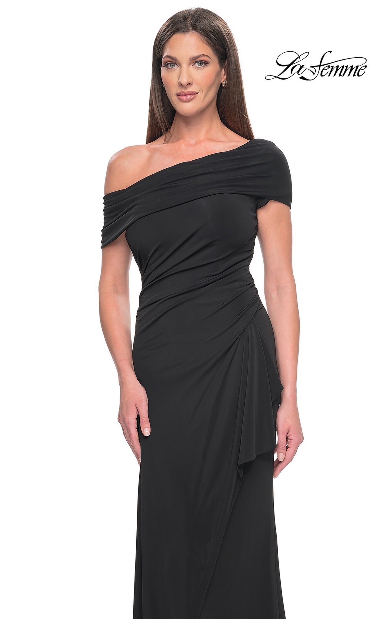 A woman wearing a black, off-the-shoulder, floor-length La Femme 31459 evening gown with ruched detailing at the waist.