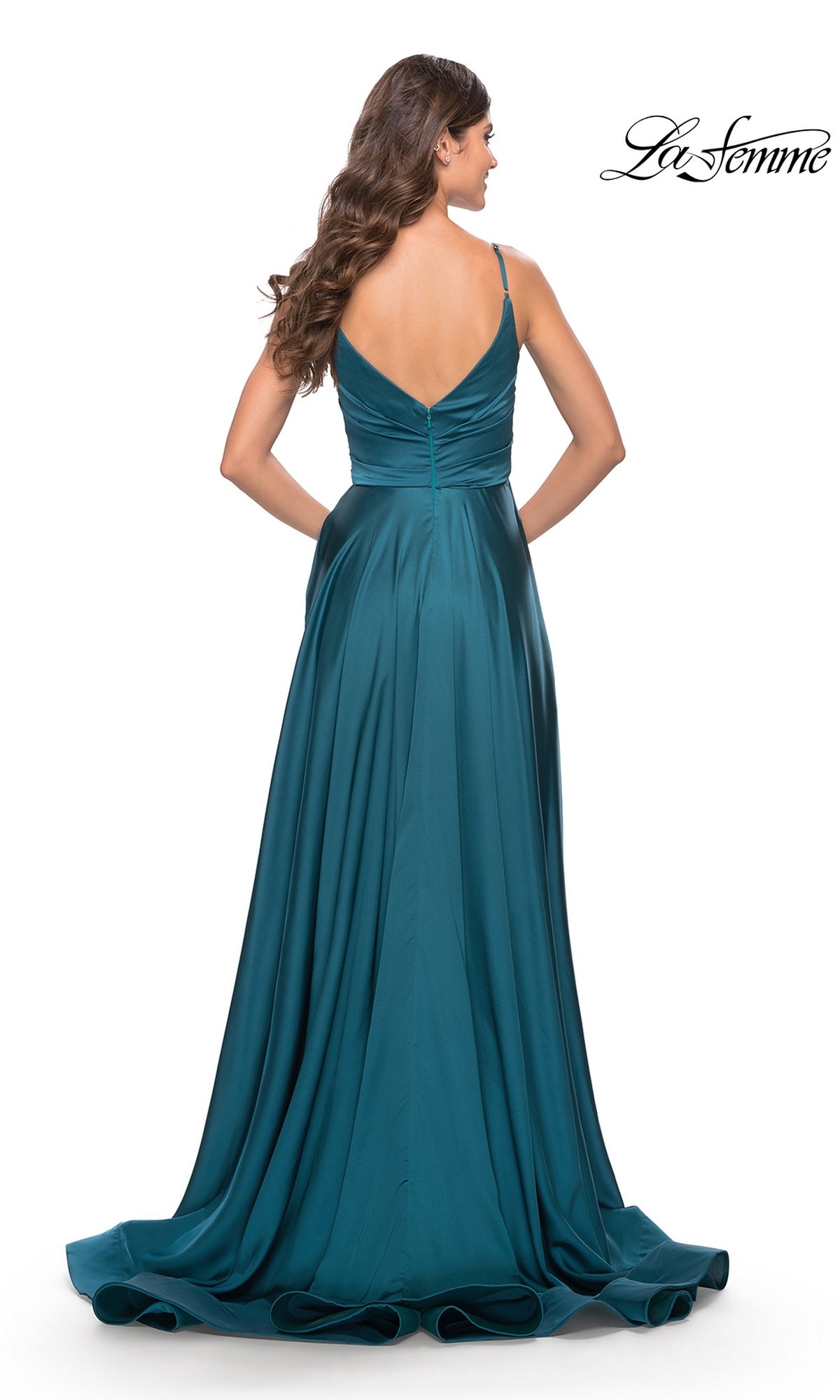 Woman wearing the La Femme V-Neck Long A-Line Prom Dress 31505 in teal satin, featuring thin straps and a V-shaped back, standing against a white background.