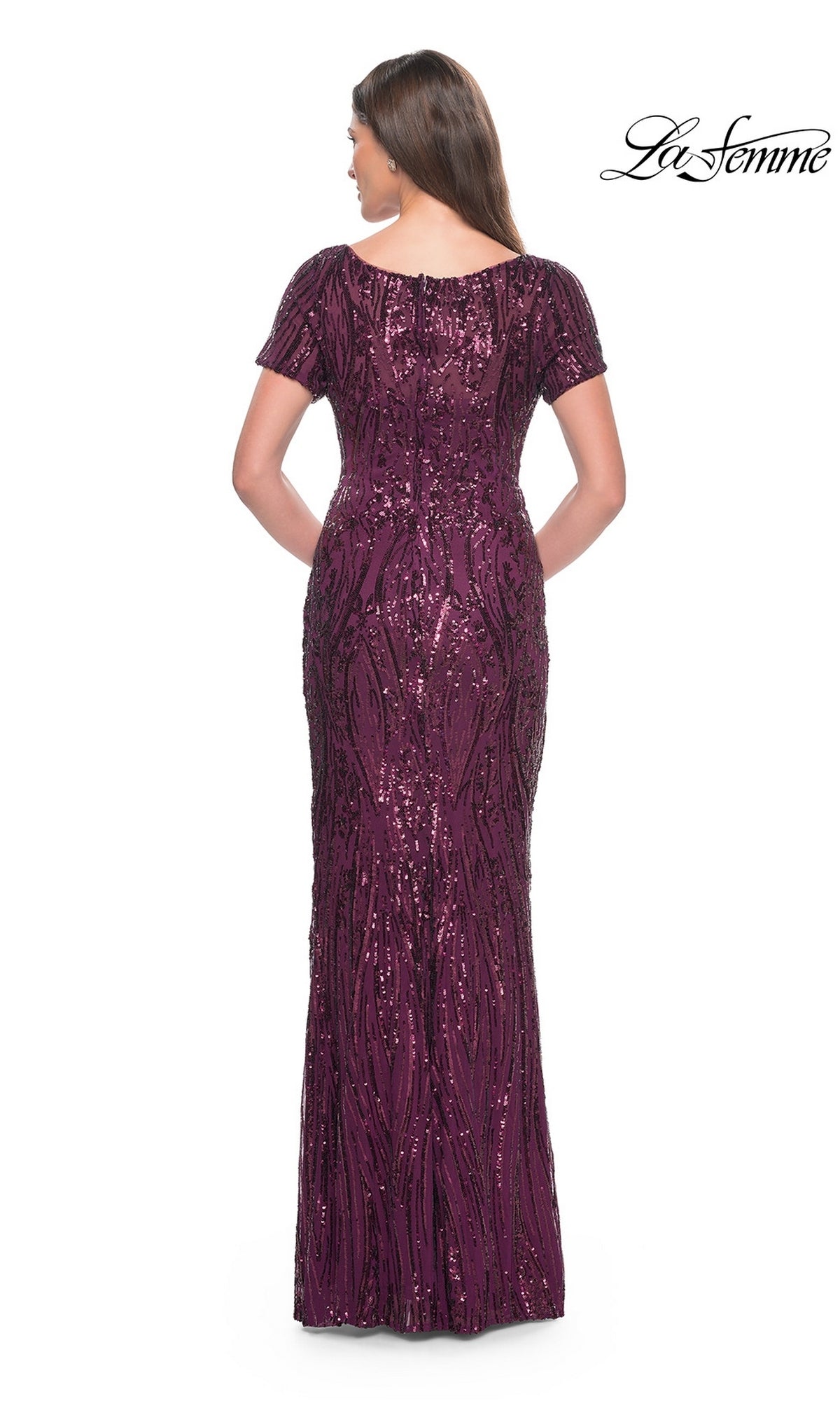 Back view of a floor-length, short-sleeve purple sequined La Femme 31852 gown featuring a wavy pattern.