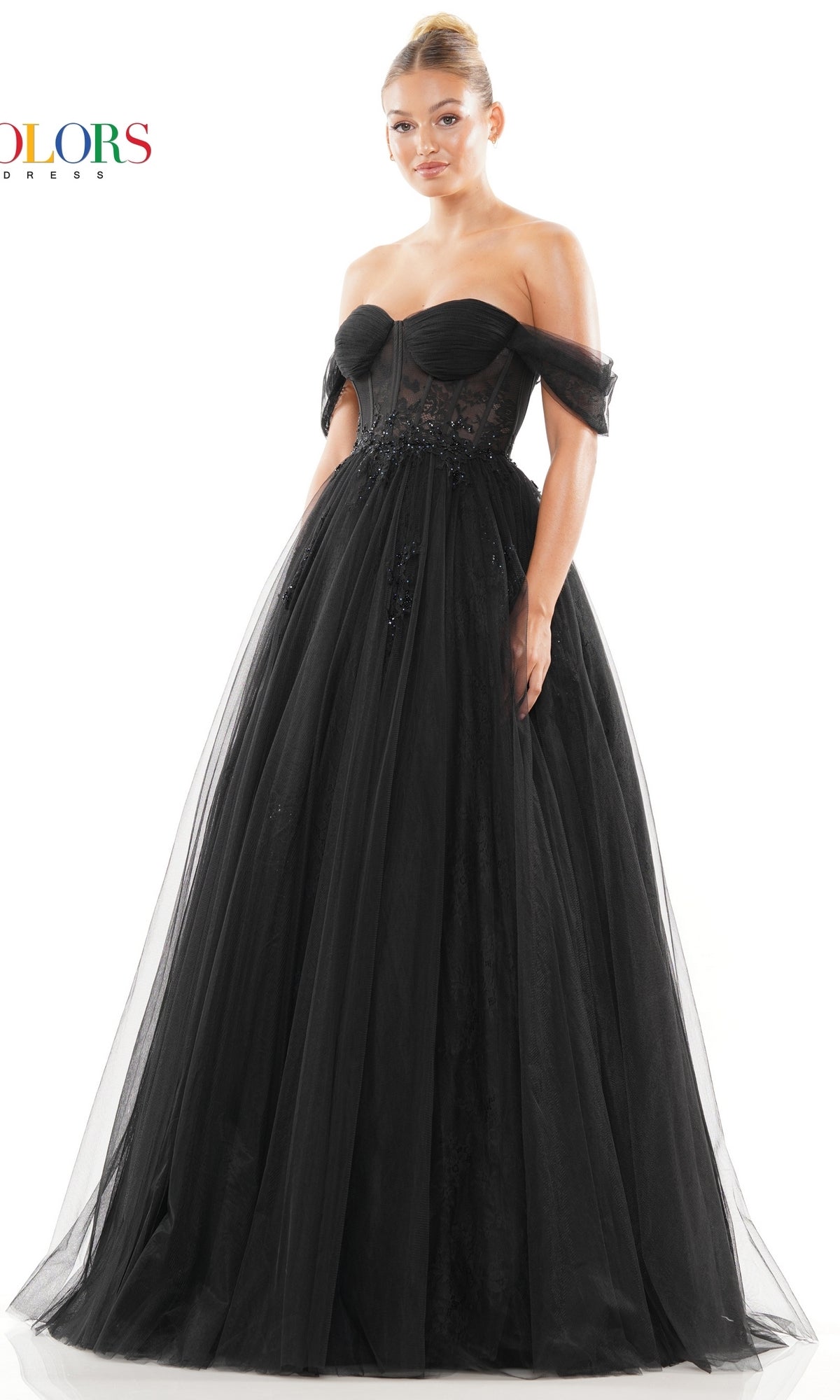 A woman in the Long Sweetheart Prom Ball Gown (Colors Dress 3240) with a strapless sweetheart neckline, fitted bodice, and full tulle skirt poses against a white background, highlighting this elegant black evening gown.