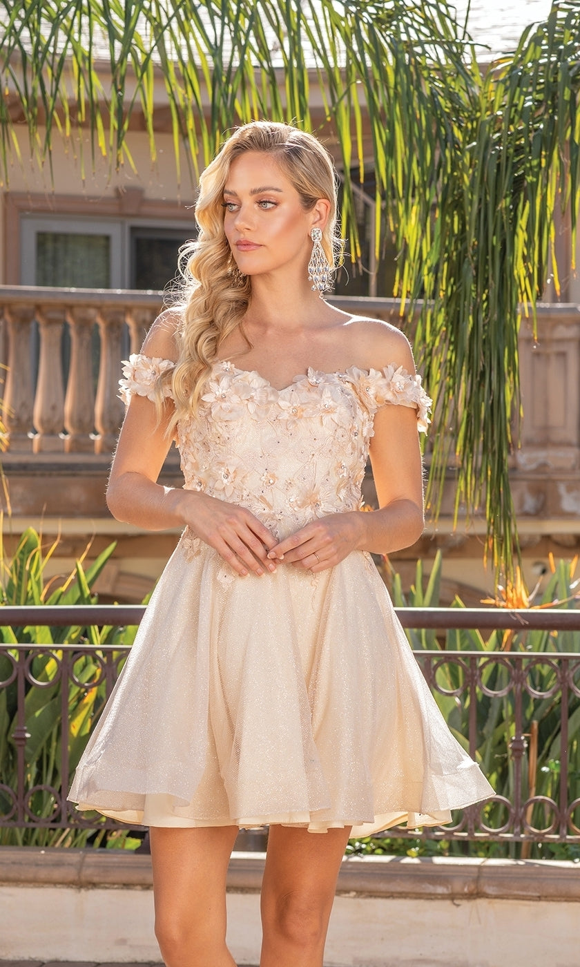 A woman stands outdoors by greenery and a building wearing a short, off-the-shoulder Corset-Back Babydoll Metallic Prom Dress.