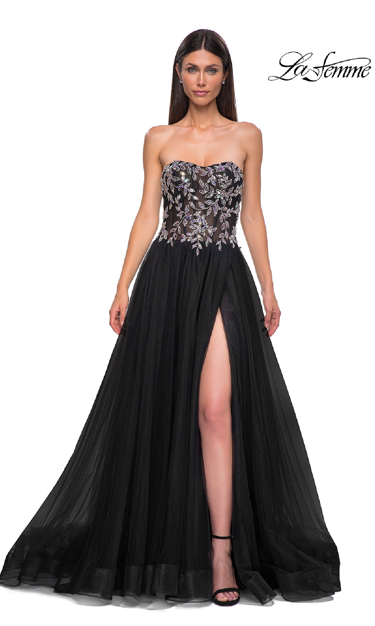 Woman wearing the La Femme 32862 Beaded-Corset Strapless Prom Gown featuring a beaded corset, floral embroidered bodice, sheer skirt, and high slit, posed against a plain white background.