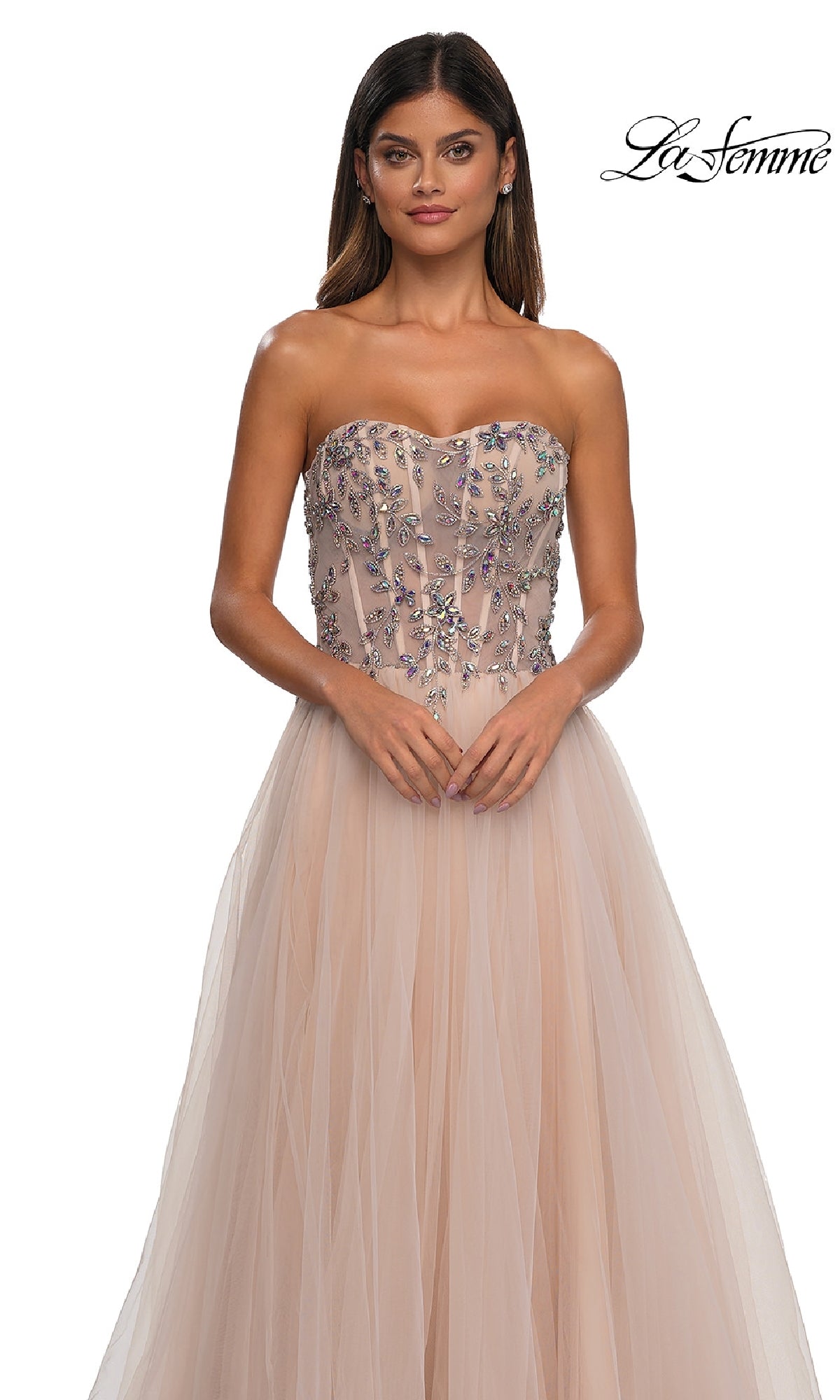 Woman models the La Femme 32862 Beaded-Corset Strapless Prom Gown, featuring a long A-line tulle skirt and sparkling corset bodice;