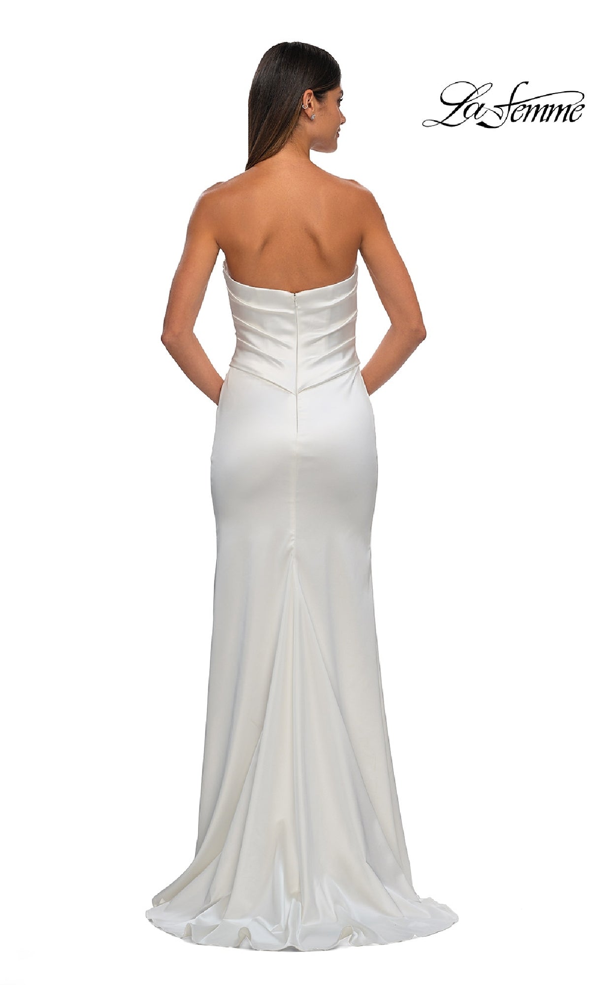 A woman is shown from the back wearing the La Femme 32896 Strapless Sweetheart Prom Gown, a fitted long white satin dress with a slight train, set against a plain white background.