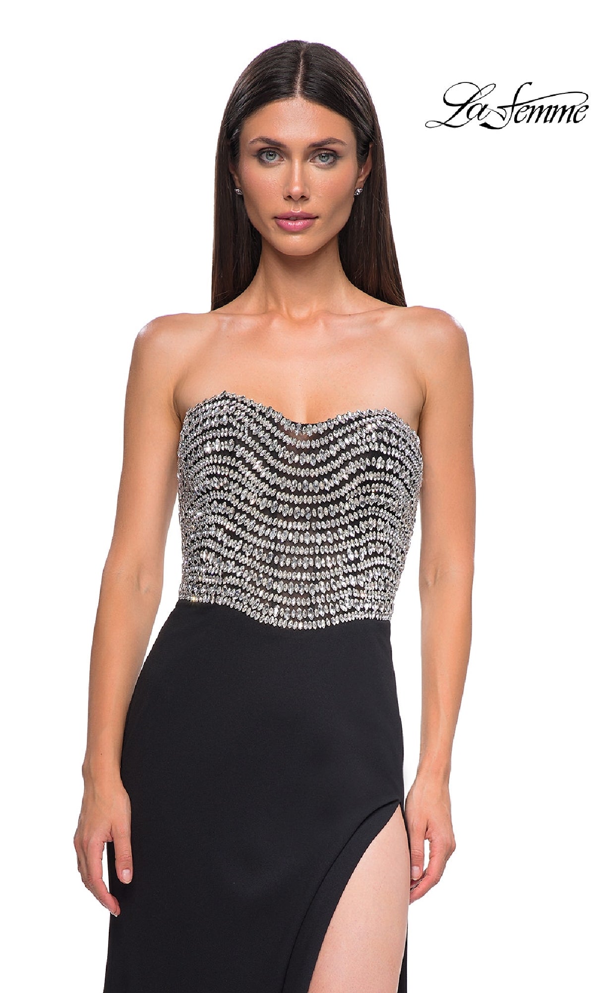 A woman stands facing forward in the Strapless Long Black Prom Dress: La Femme 32910, featuring a beaded bodice and thigh-high slit. The La Femme logo appears in the top right corner.
