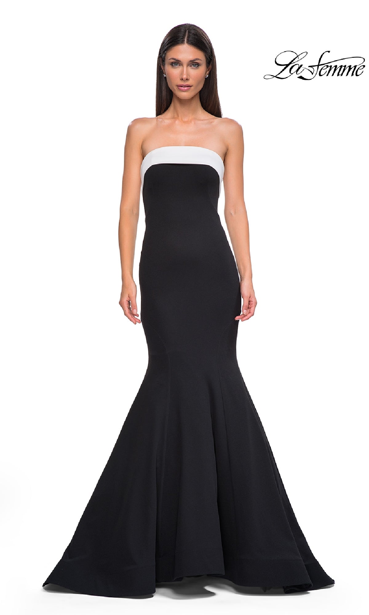 A woman models the La Femme 32914 strapless long black prom dress with a white band across the top, standing against a plain white background.