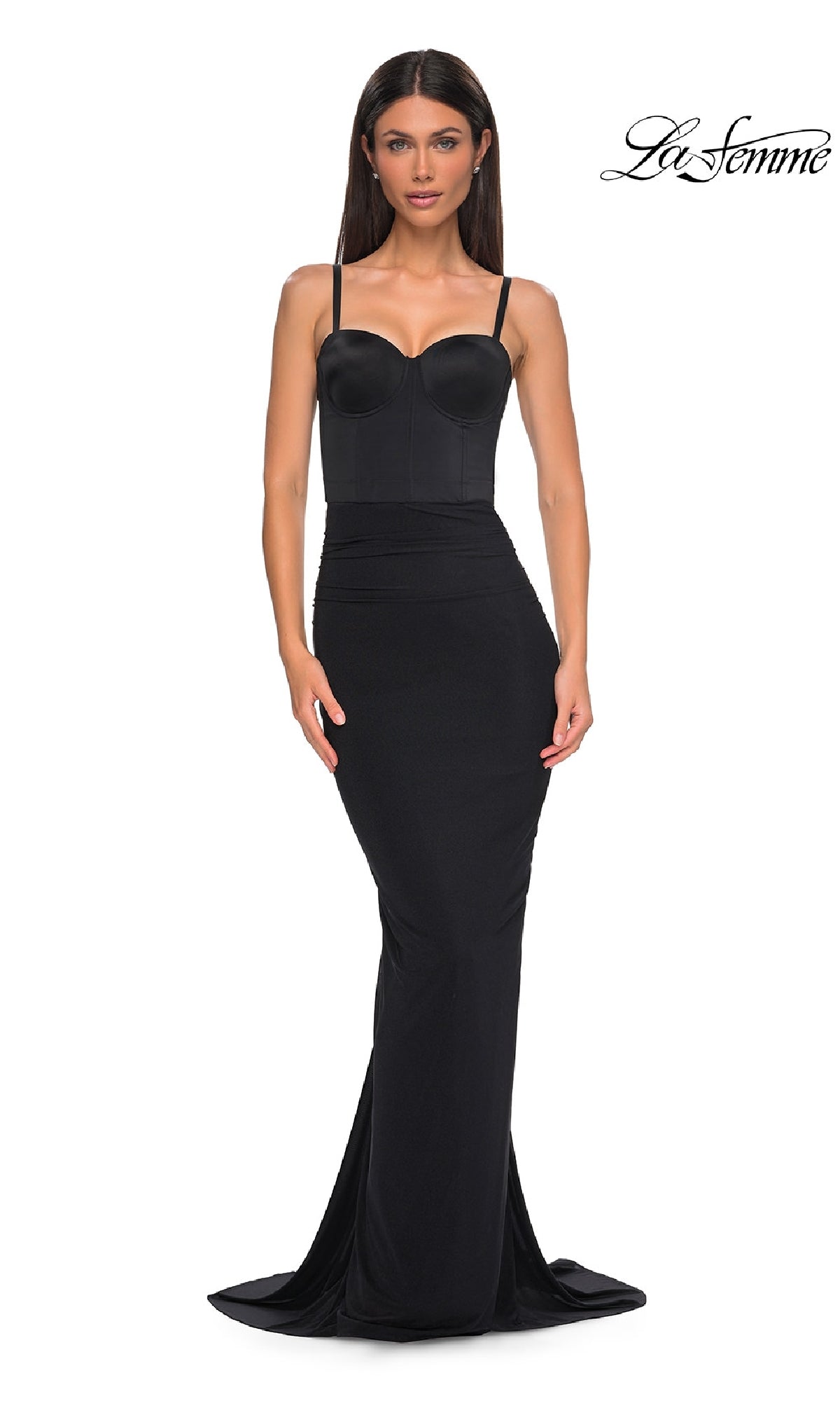 Woman wearing the Cut-Out Long Black Prom Dress: La Femme 32996, a fitted, floor-length prom dress with spaghetti straps and a corset-style bodice; La Femme logo appears in the top right corner.