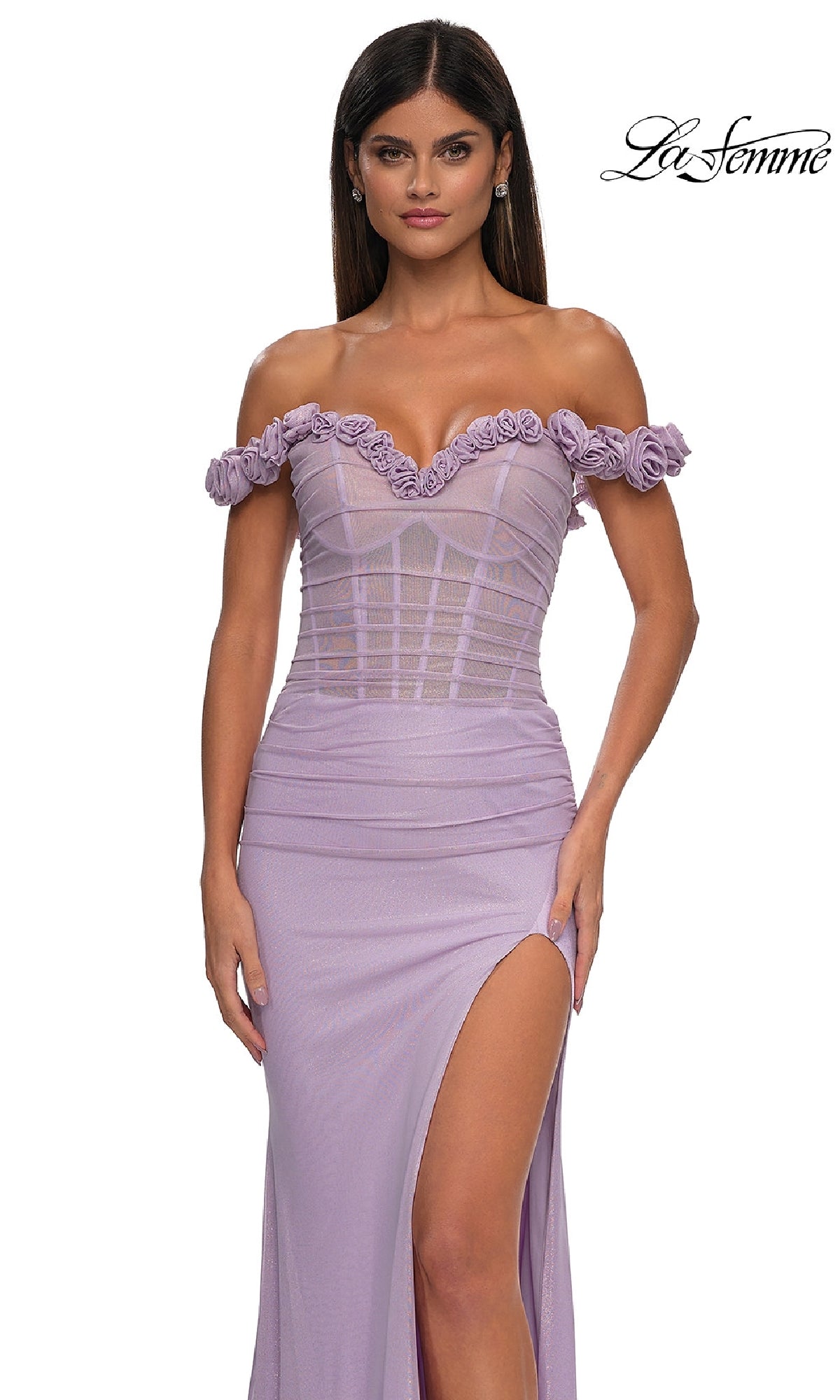 Woman wearing La Femme 33004, a sheer-corset long prom dress, standing against a white background with the