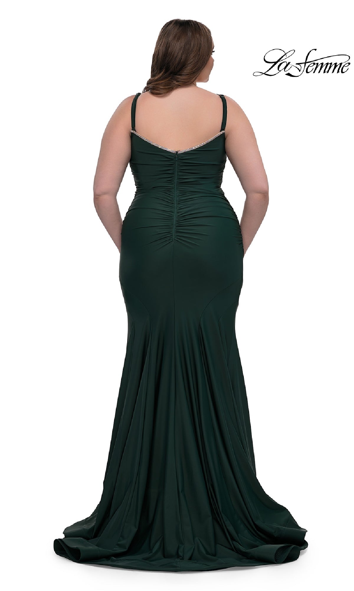 A woman is seen from the back wearing the Plus-Size Floor-Length Prom Dress: La Femme 33057 in dark green, featuring thin straps and a slight train, set against a white background.