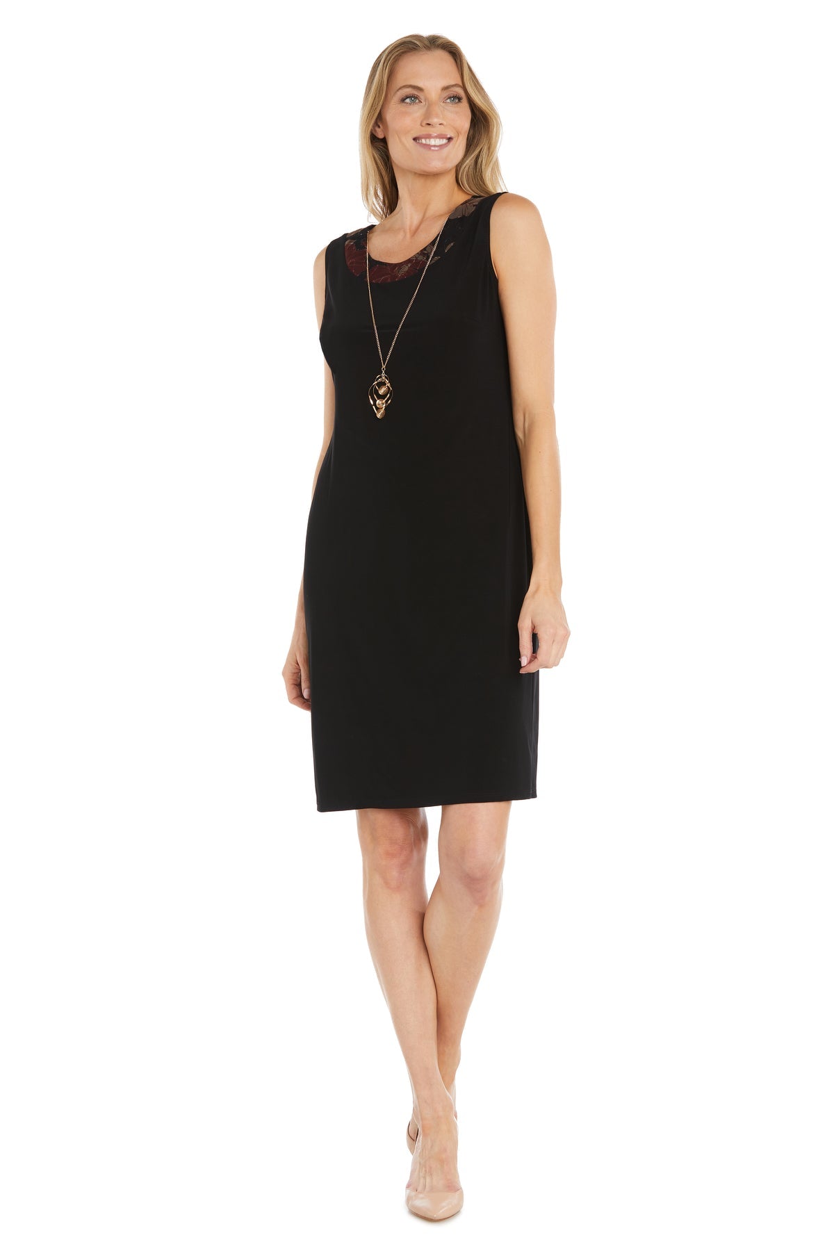 Woman wearing the Petite Two-Piece Party Dress: R&M Richards 3312, styled with a long necklace and nude heels, standing against a white background.
