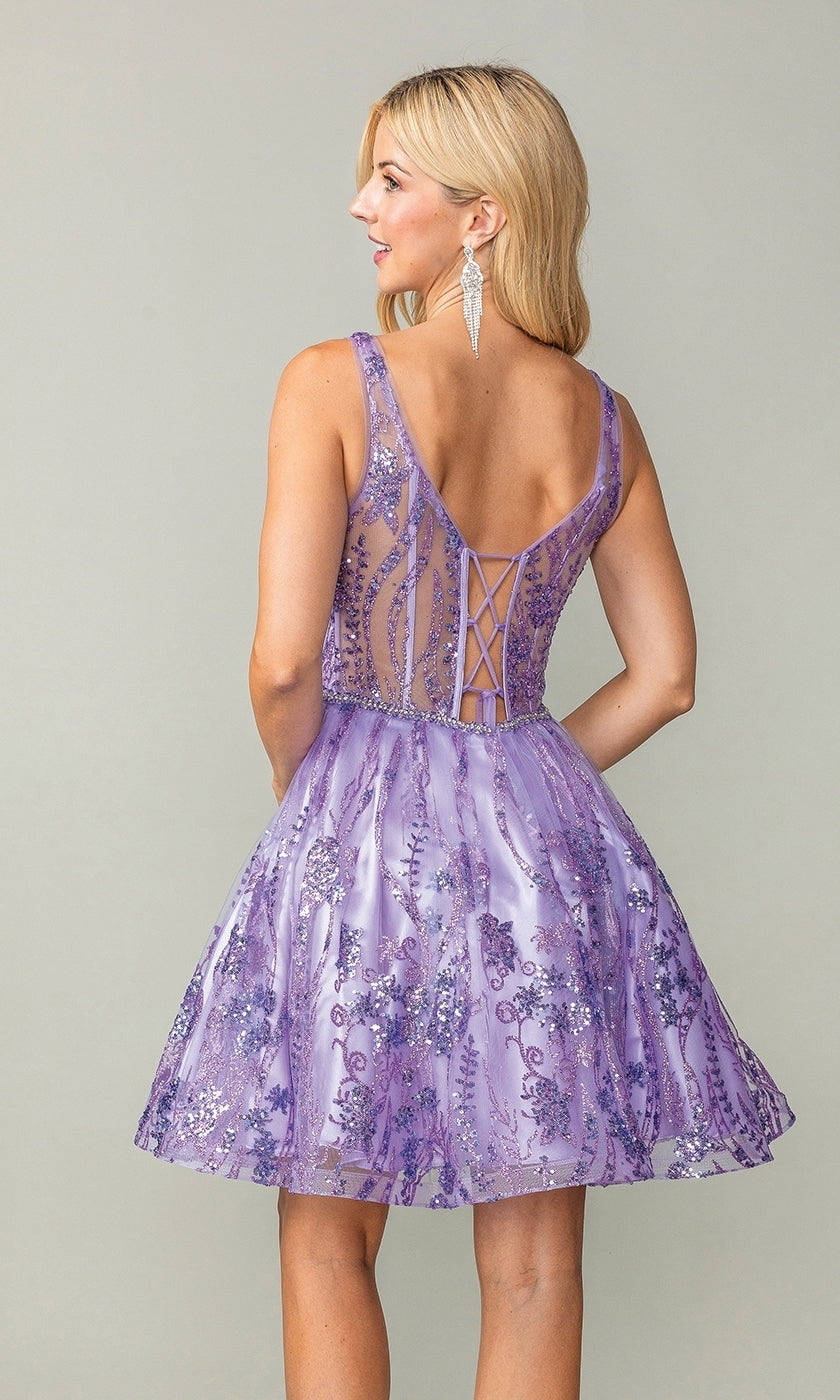 A woman stands against a plain background wearing the Dancing Queen 3364, a sleeveless lavender short homecoming dress featuring glittery floral patterns and a lace-up back.