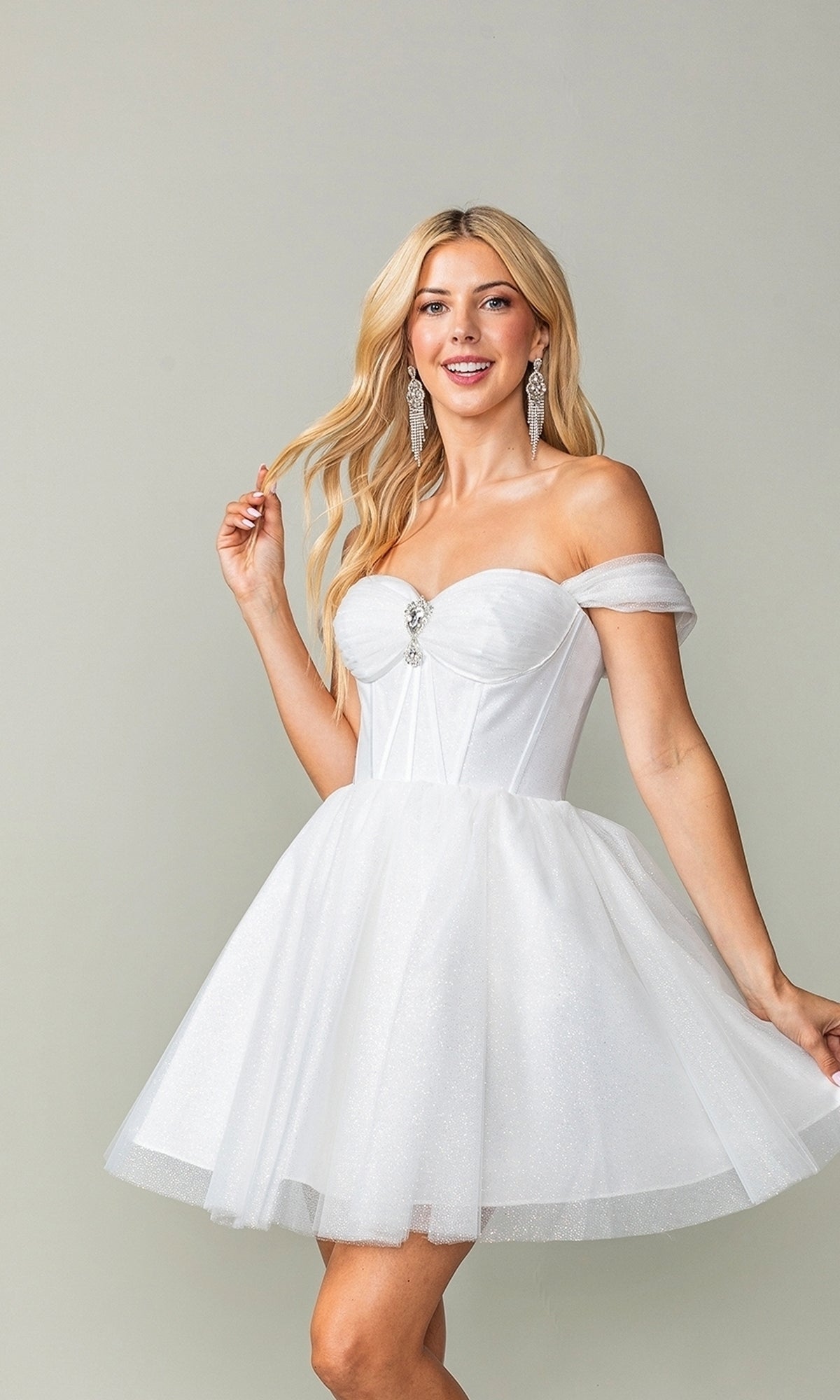 Woman modeling the Off-Shoulder Short Fit-and-Flare Hoco Dress 3394, featuring a fitted corset-style bodice and flared skirt, posed against a plain background.