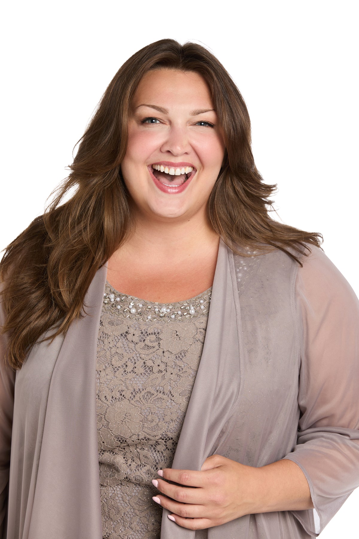 A woman with long brown hair smiles widely while wearing the Plus-Size Short Jacket Dress: R&M Richards 3594W, standing against a white background.